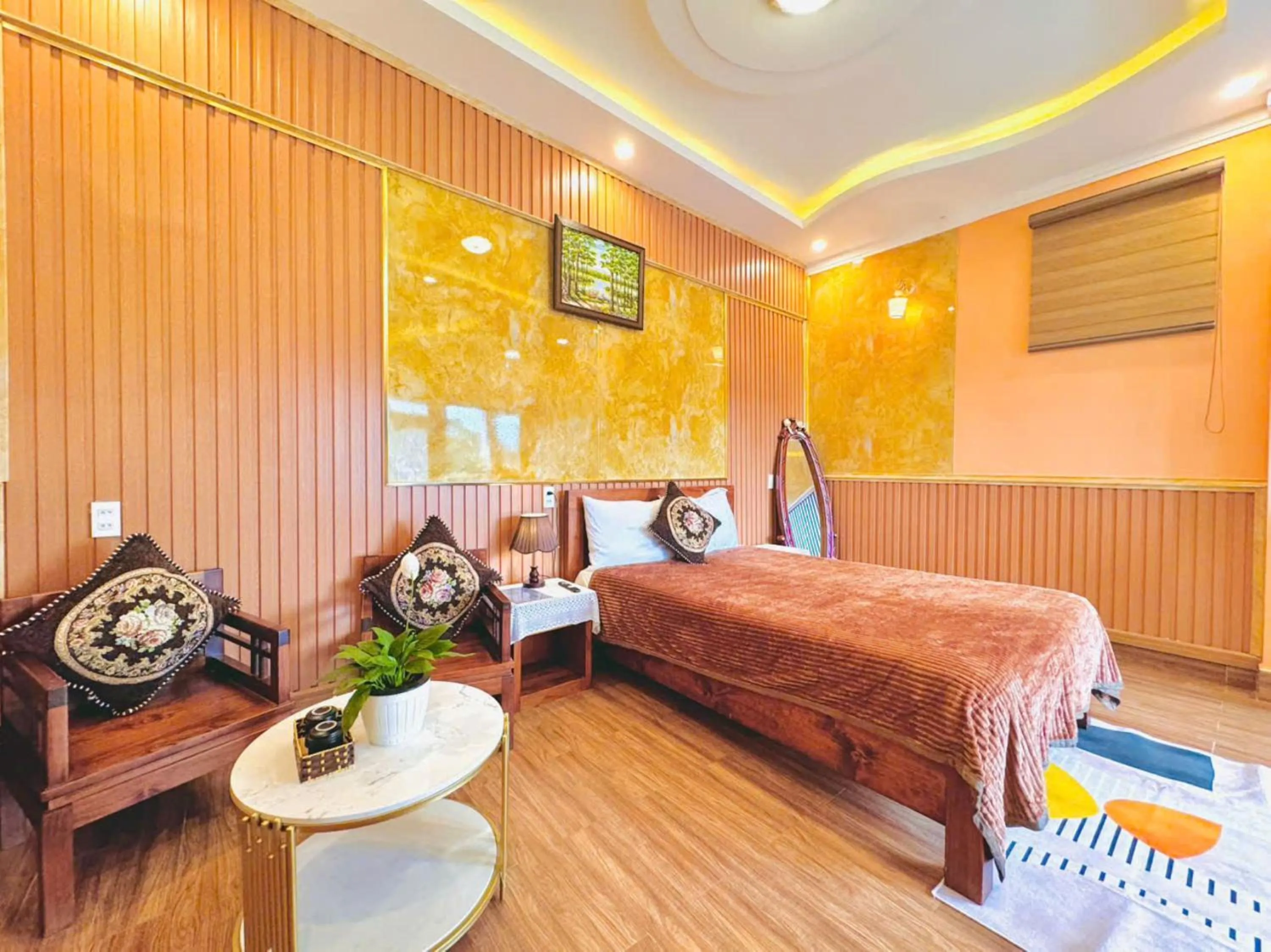 Seating area, Bed in Pine Forest House Dalat