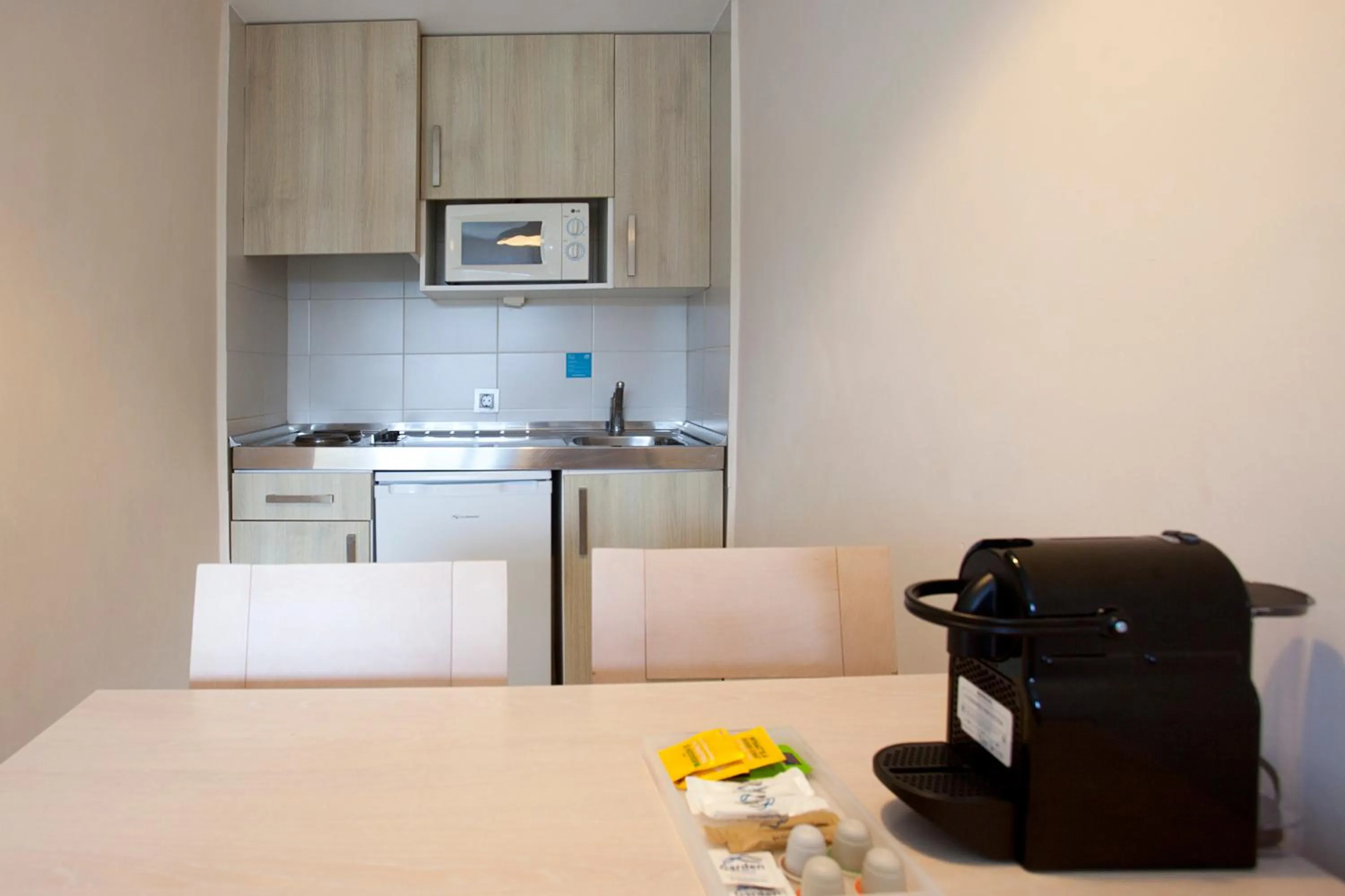 Kitchen or kitchenette, Bed in Palm Garden