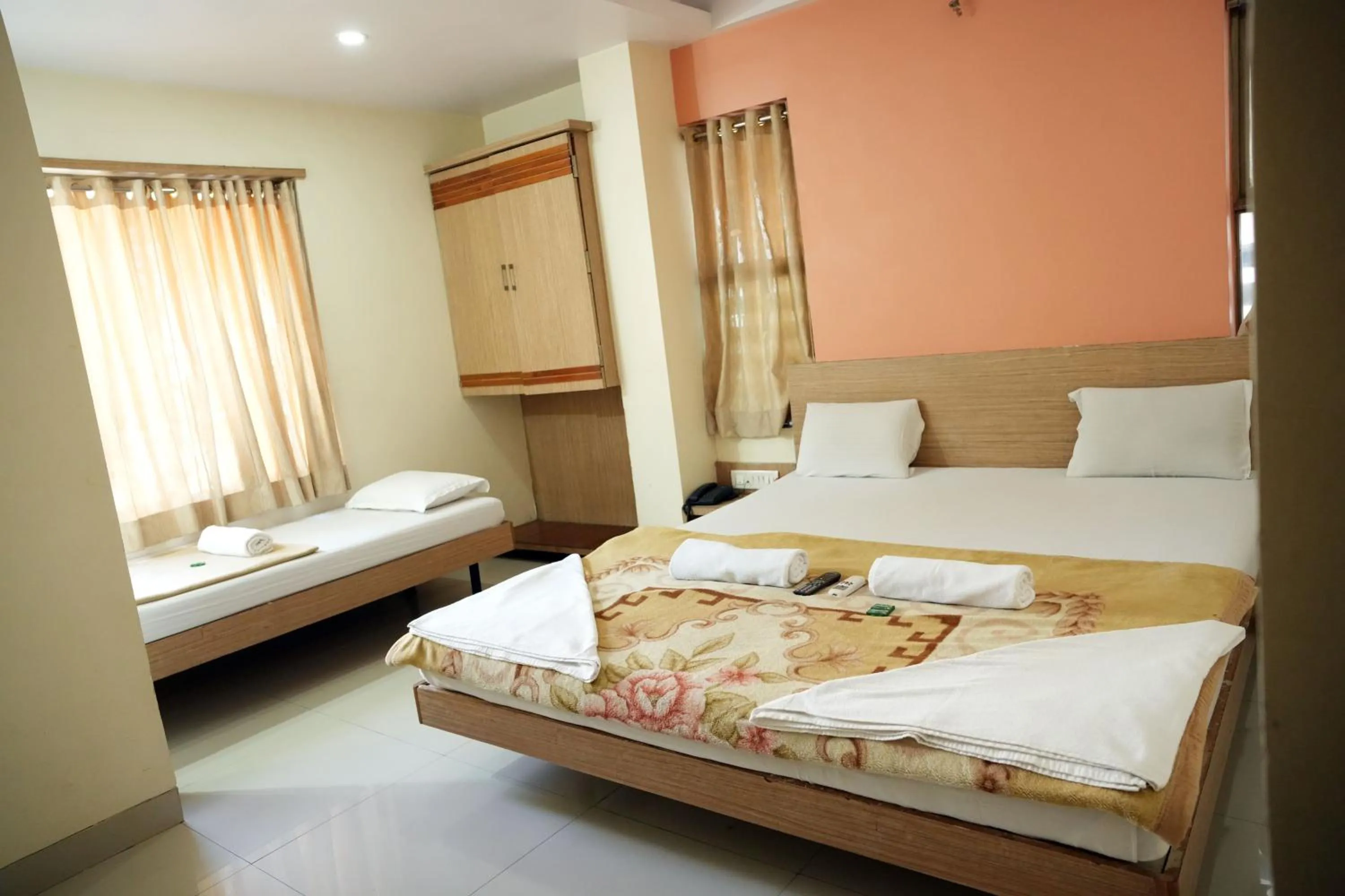 Bed in HOTEL SAI SURYA