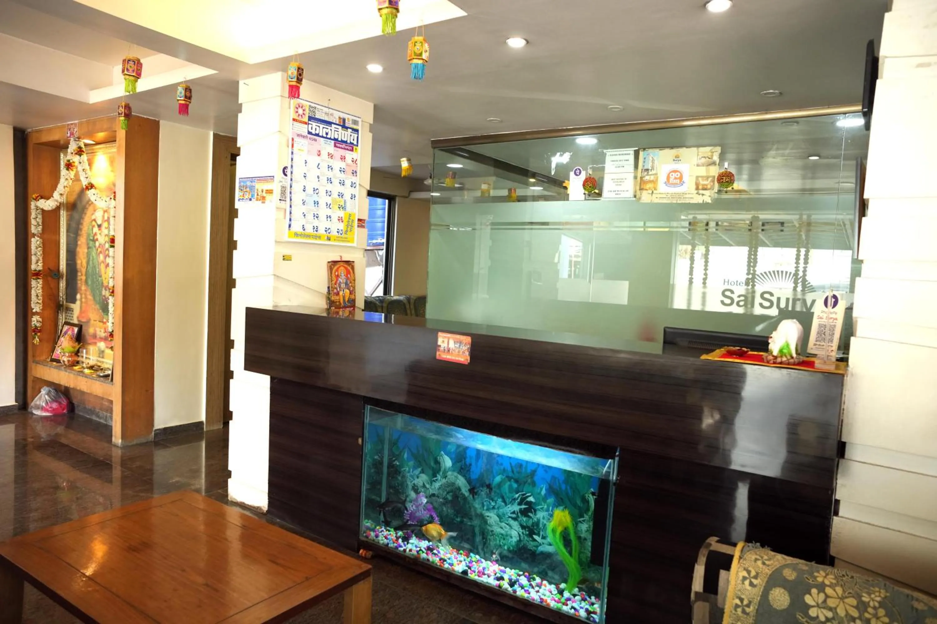 Communal lounge/ TV room in HOTEL SAI SURYA