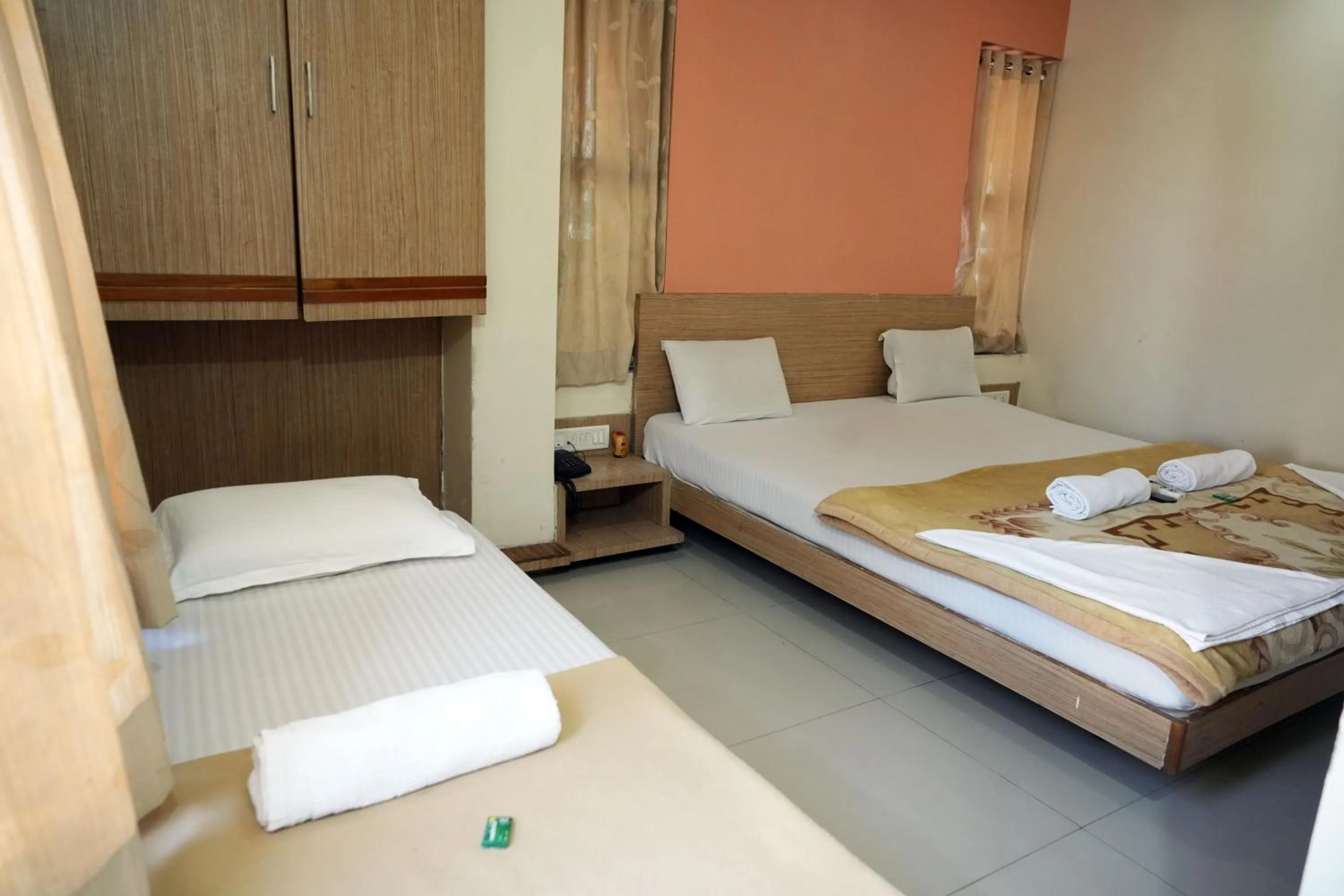 Bed in HOTEL SAI SURYA