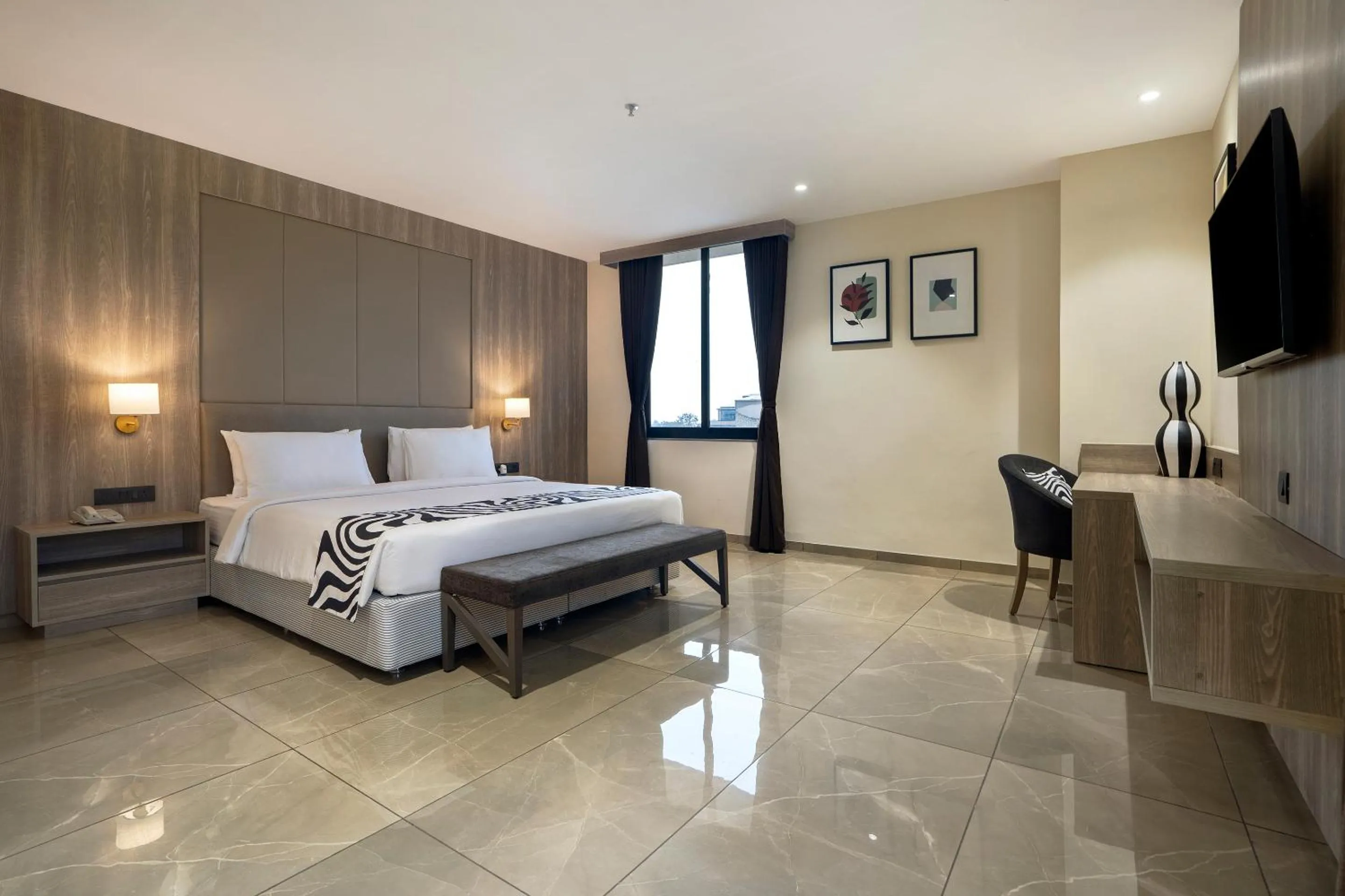 Bed in Sunday Hotel by CheckIn Vadodara