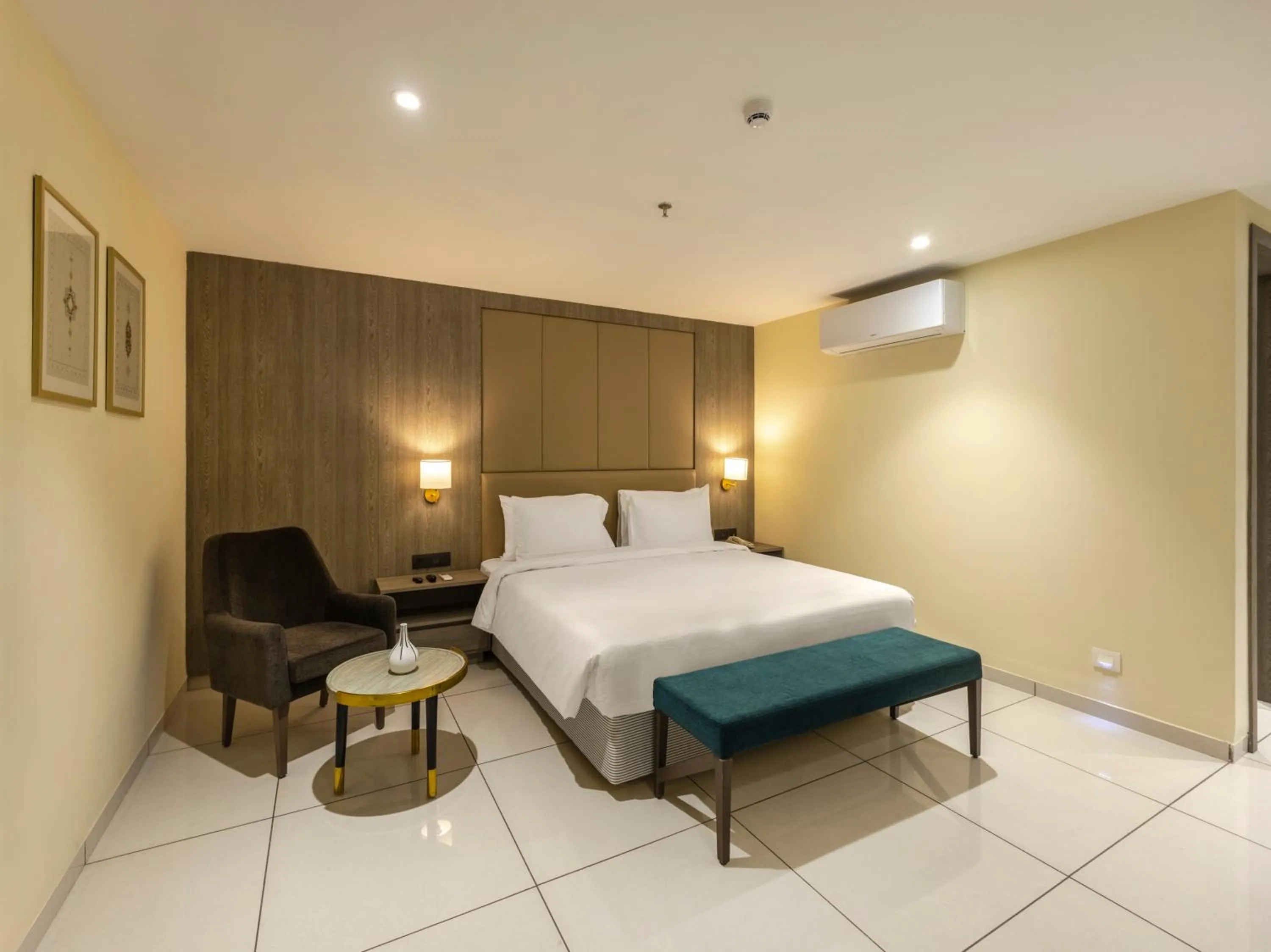 Bed in Sunday Hotel by CheckIn Vadodara