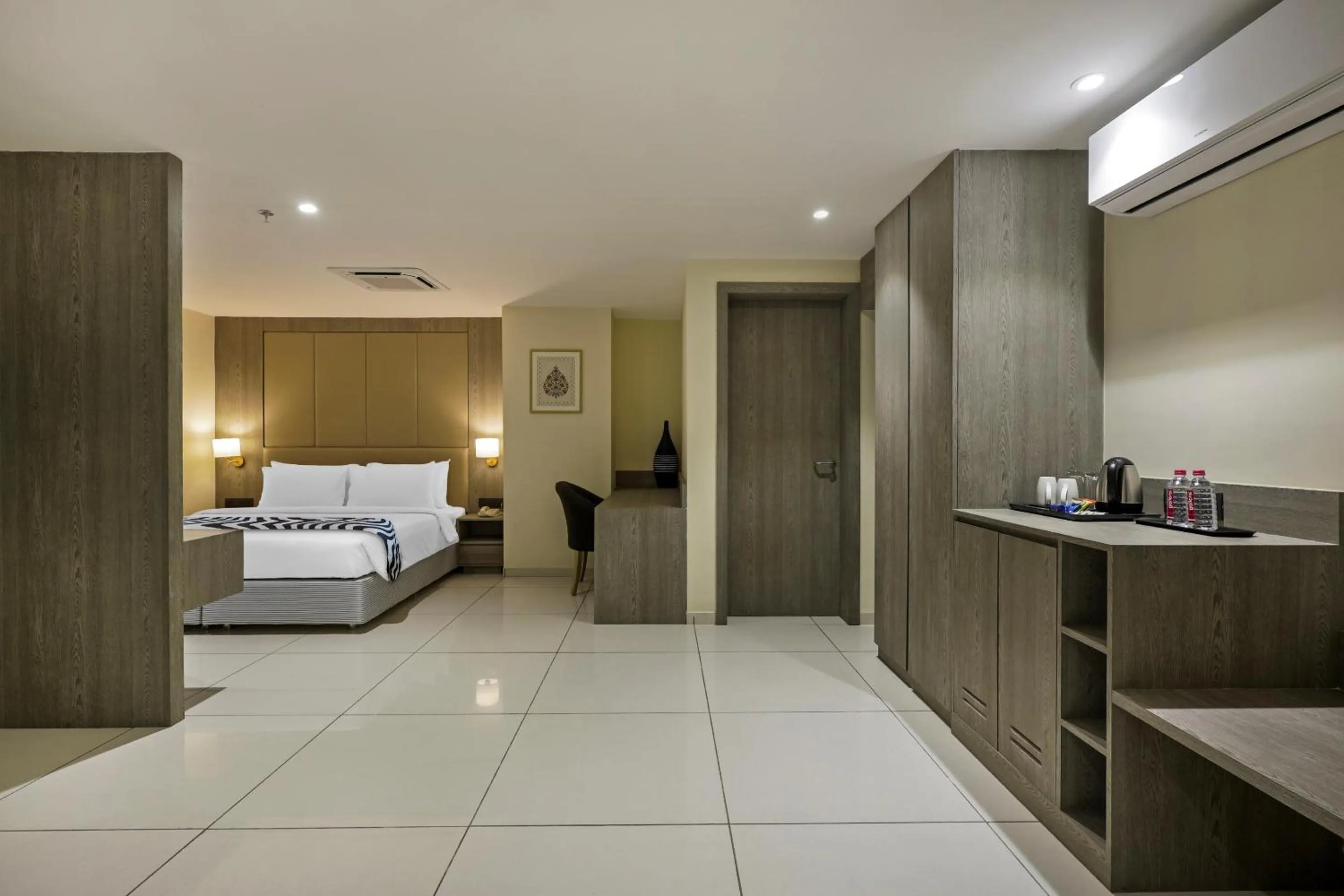 Bed in Sunday Hotel by CheckIn Vadodara