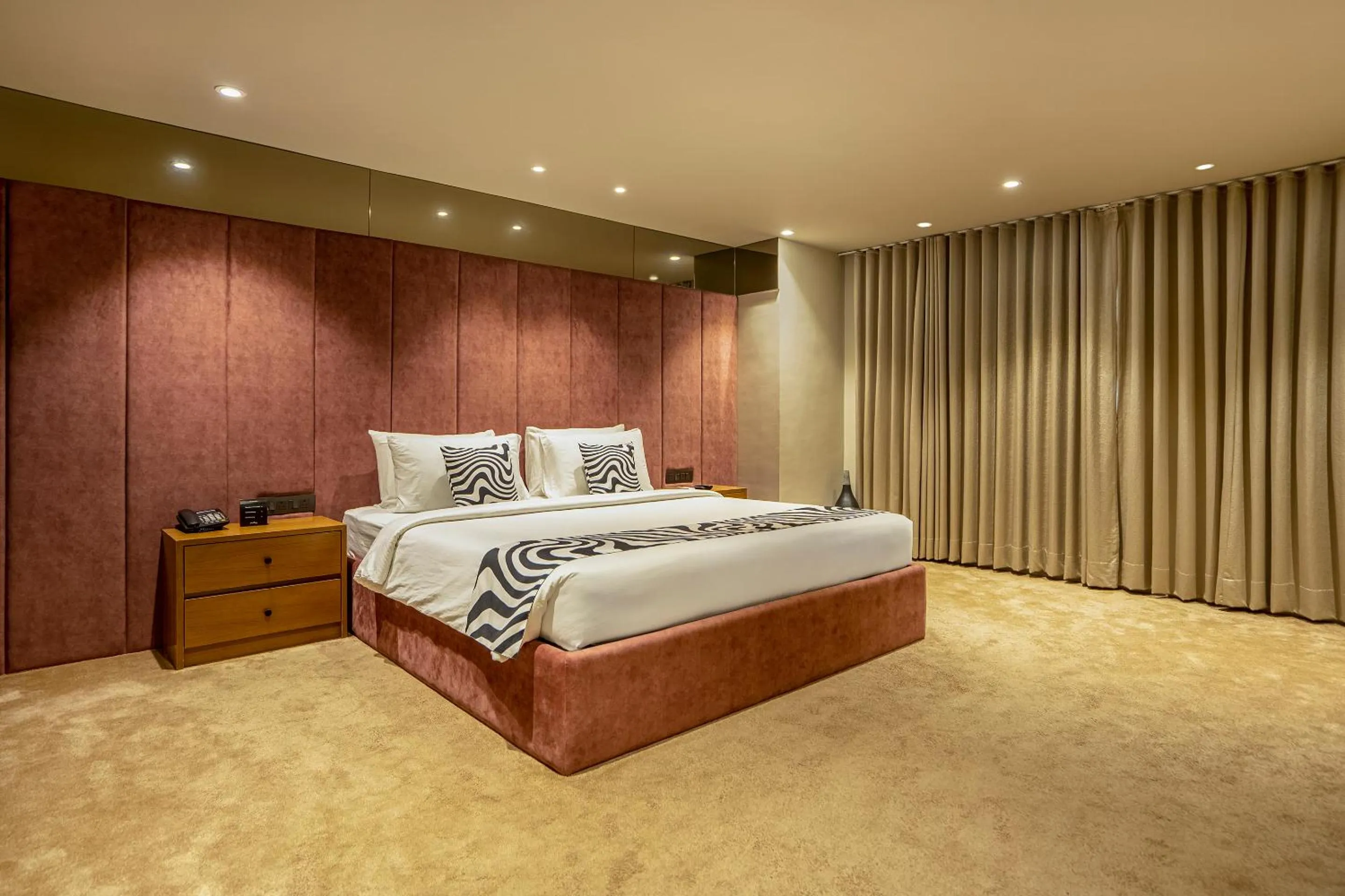 Photo of the whole room, Bed in Sunday Hotel by CheckIn Vadodara