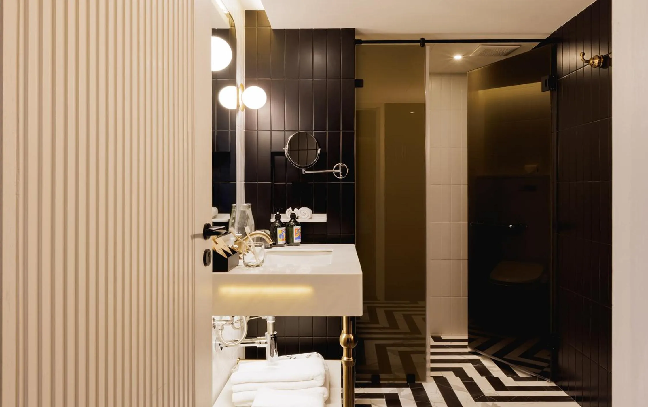 Bathroom in Public House Bangkok, a Member of Design Hotels