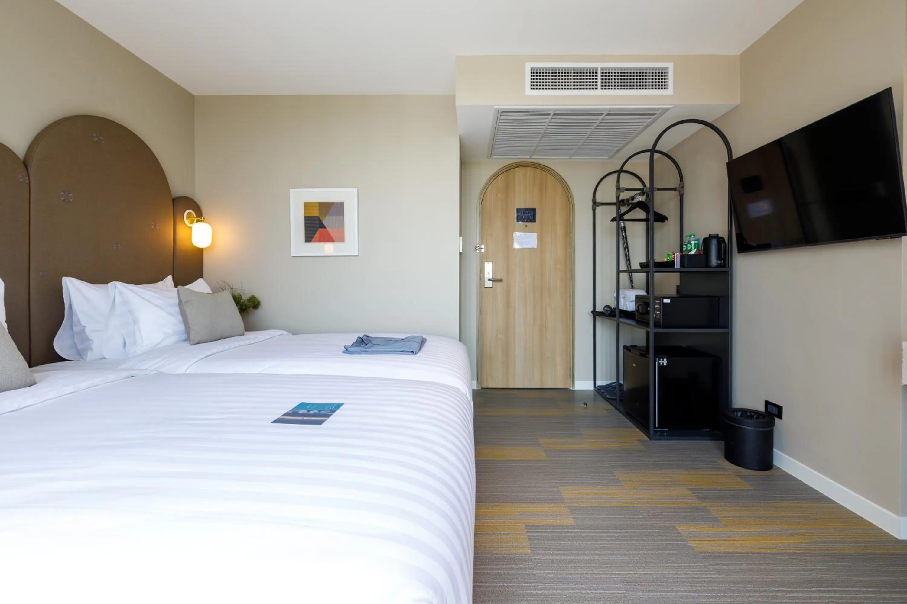 Bed in Benjarong Hotel Bangkok Ratchada