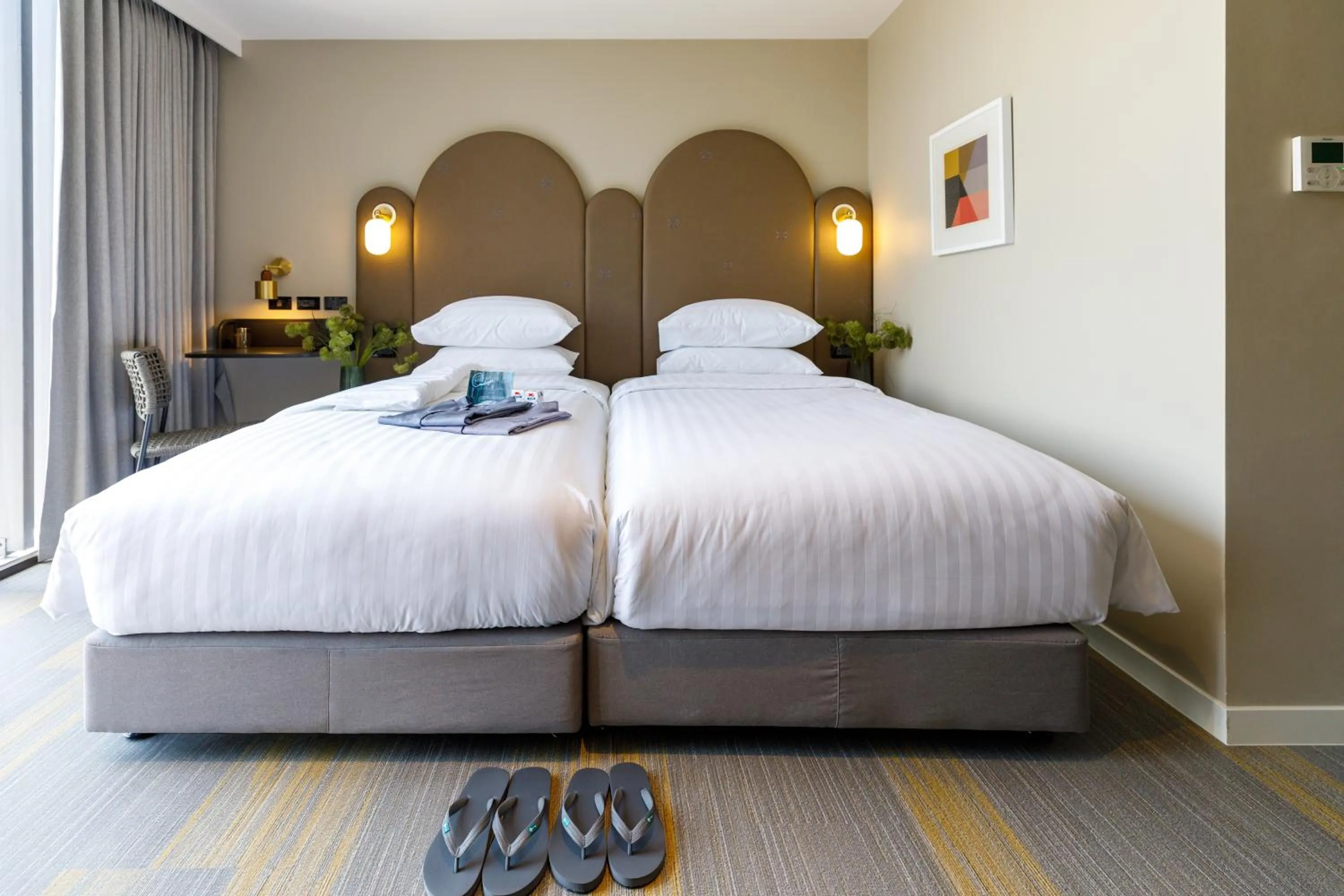 Bed in Benjarong Hotel Bangkok Ratchada