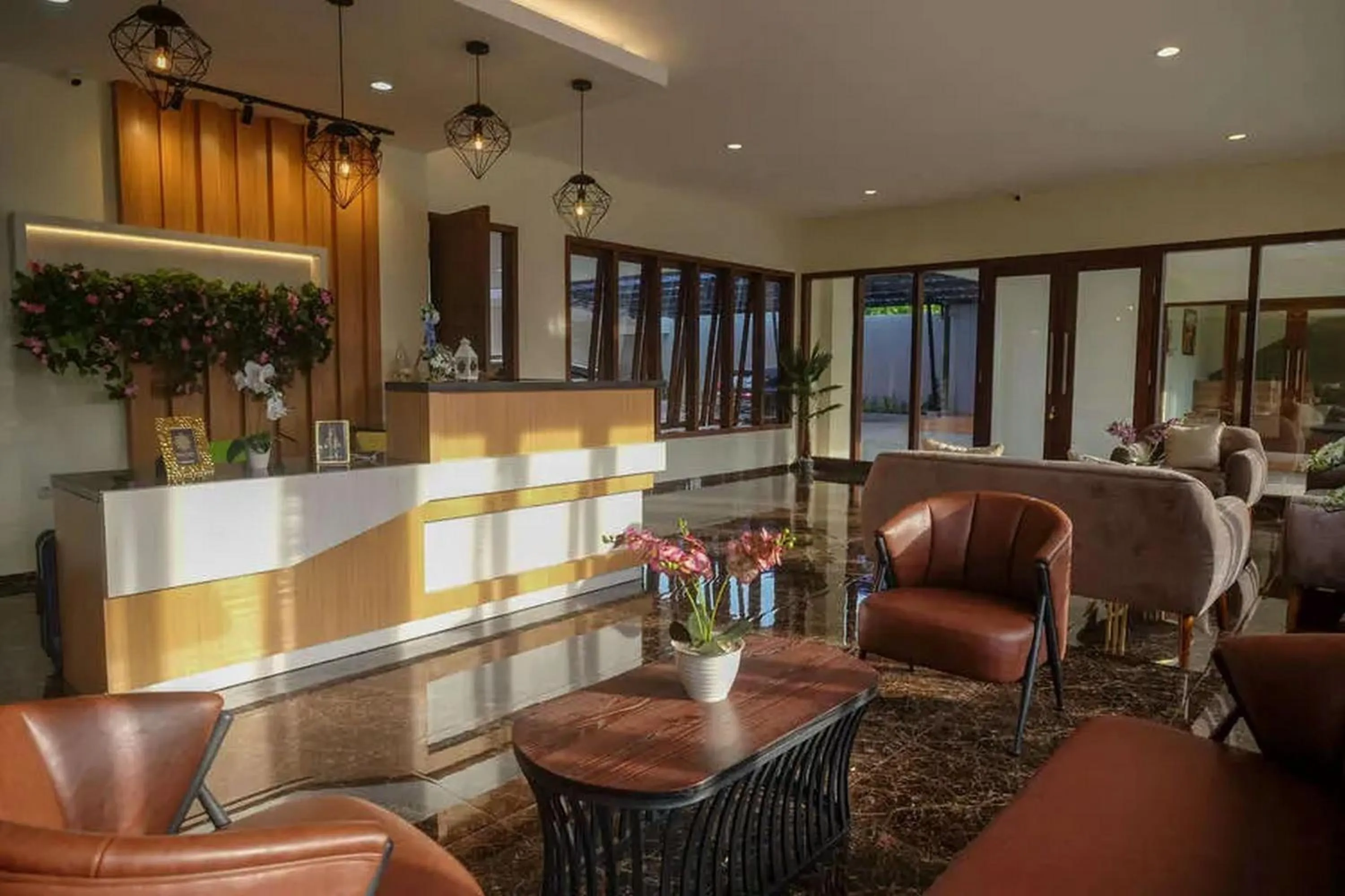 Living room in Urbanview Sumampir Anugrah Purwokerto by RedDoorz