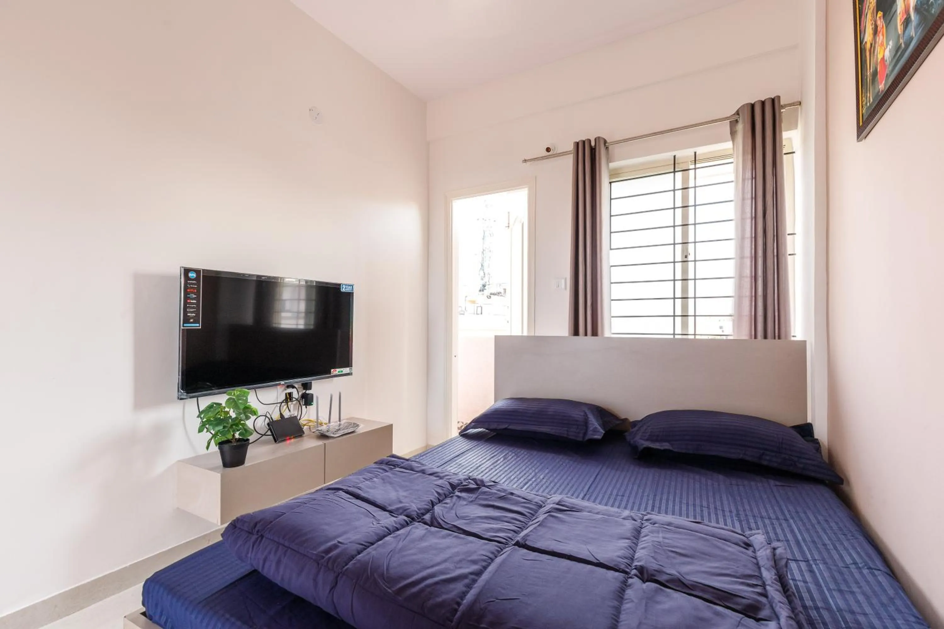 Bed in Sunrise Service Apartments