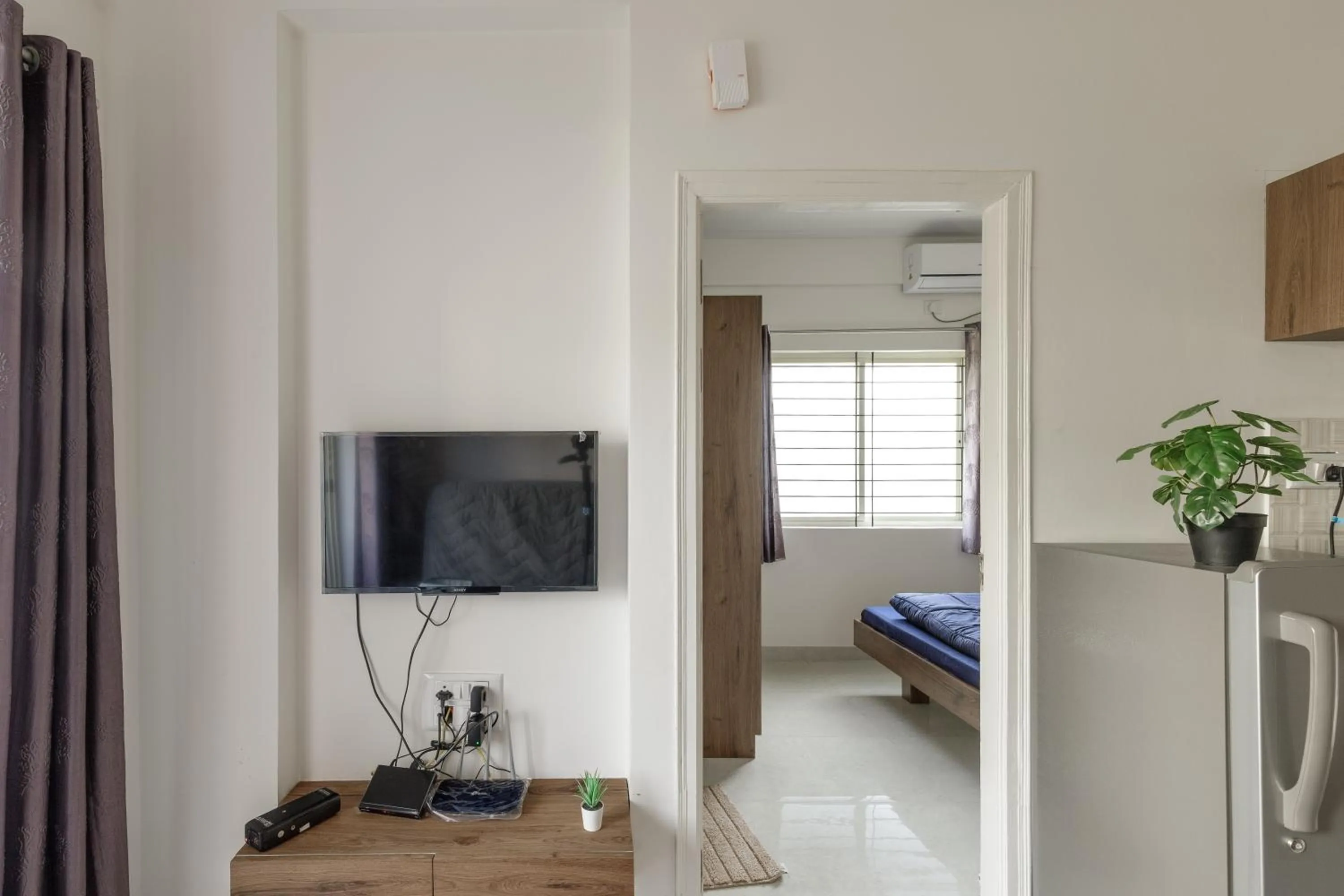 Bed in Sunrise Service Apartments