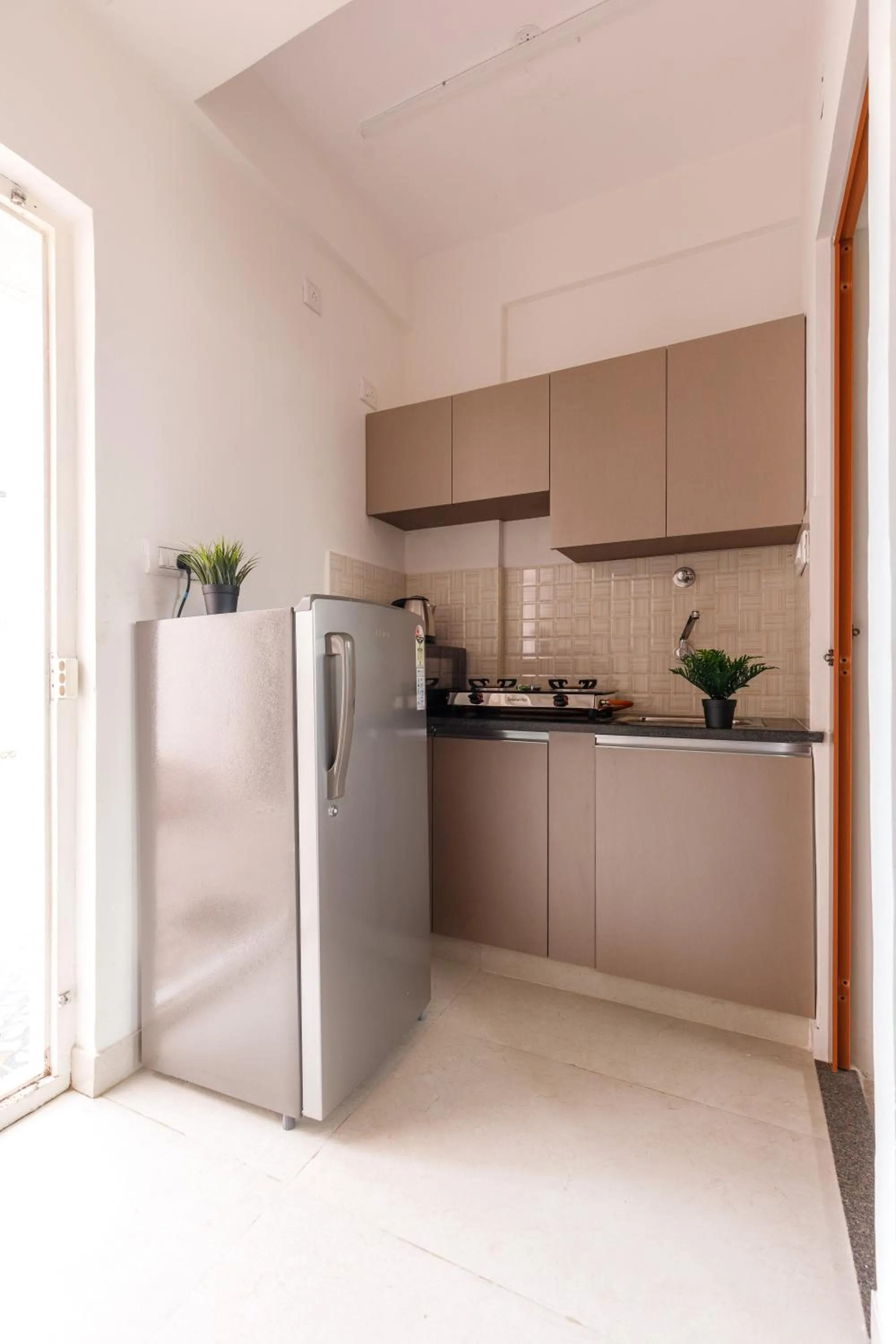 Kitchen or kitchenette in Sunrise Service Apartments