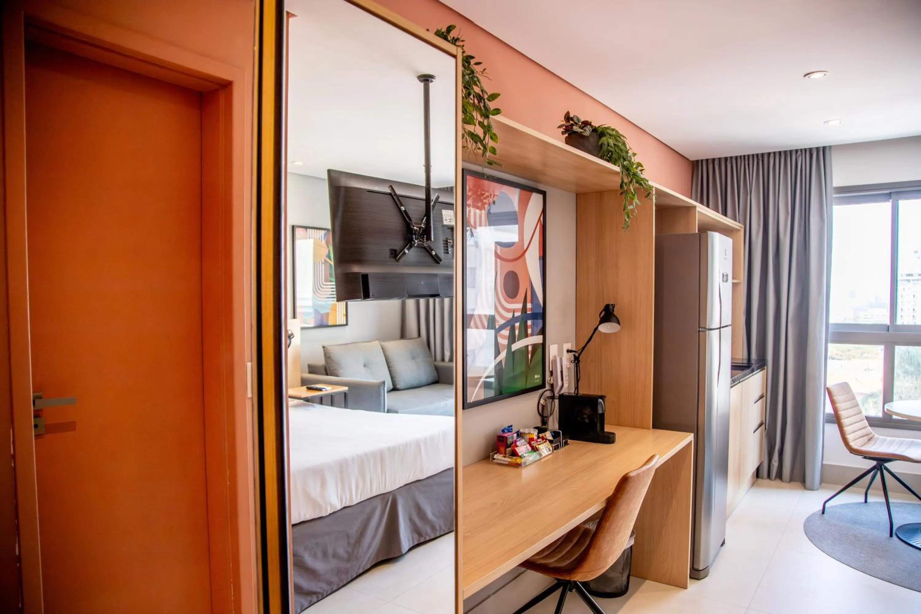 Seating area in Cozzy Suites Paraíso Hotel