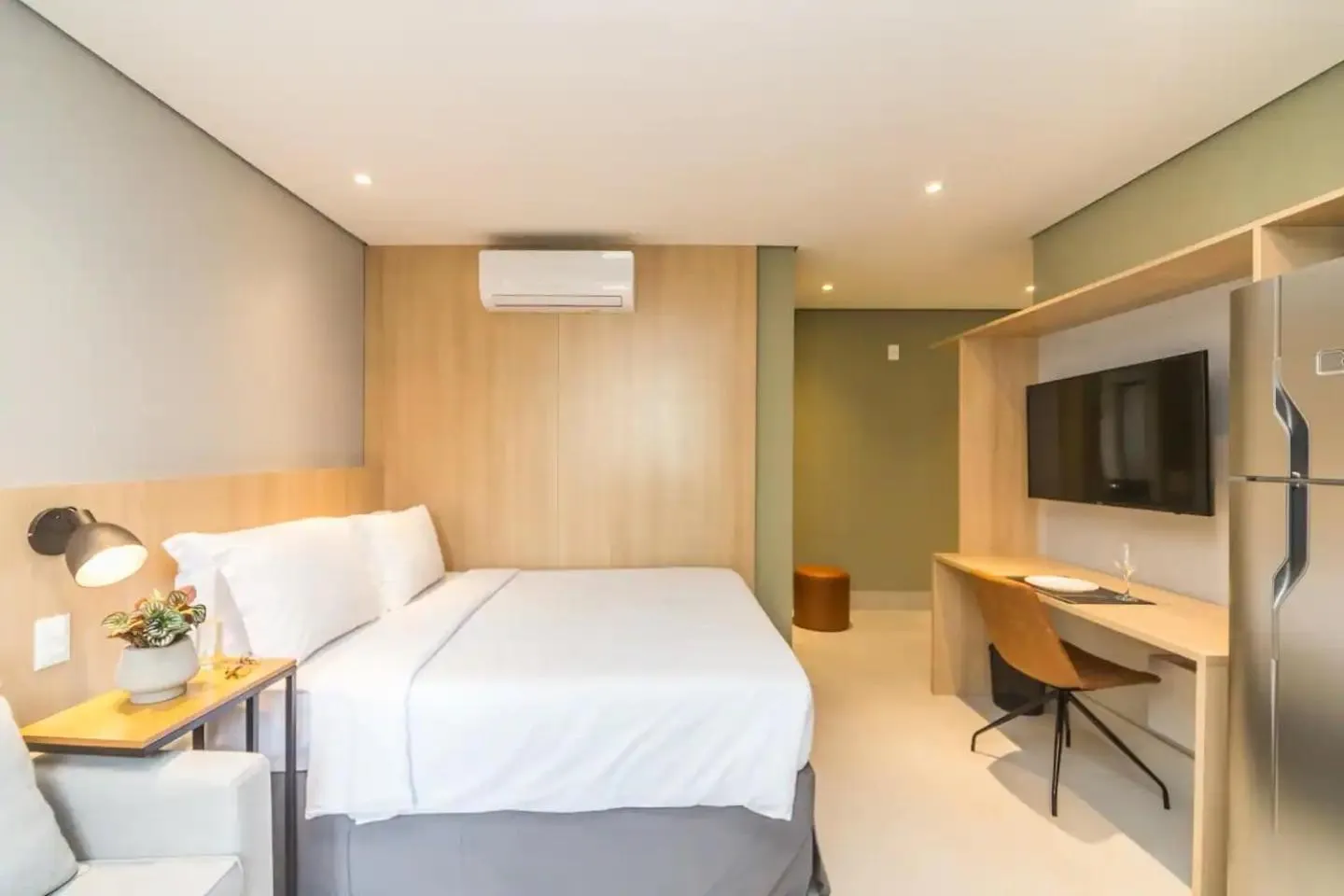 Bed in Cozzy Suites Paraíso Hotel