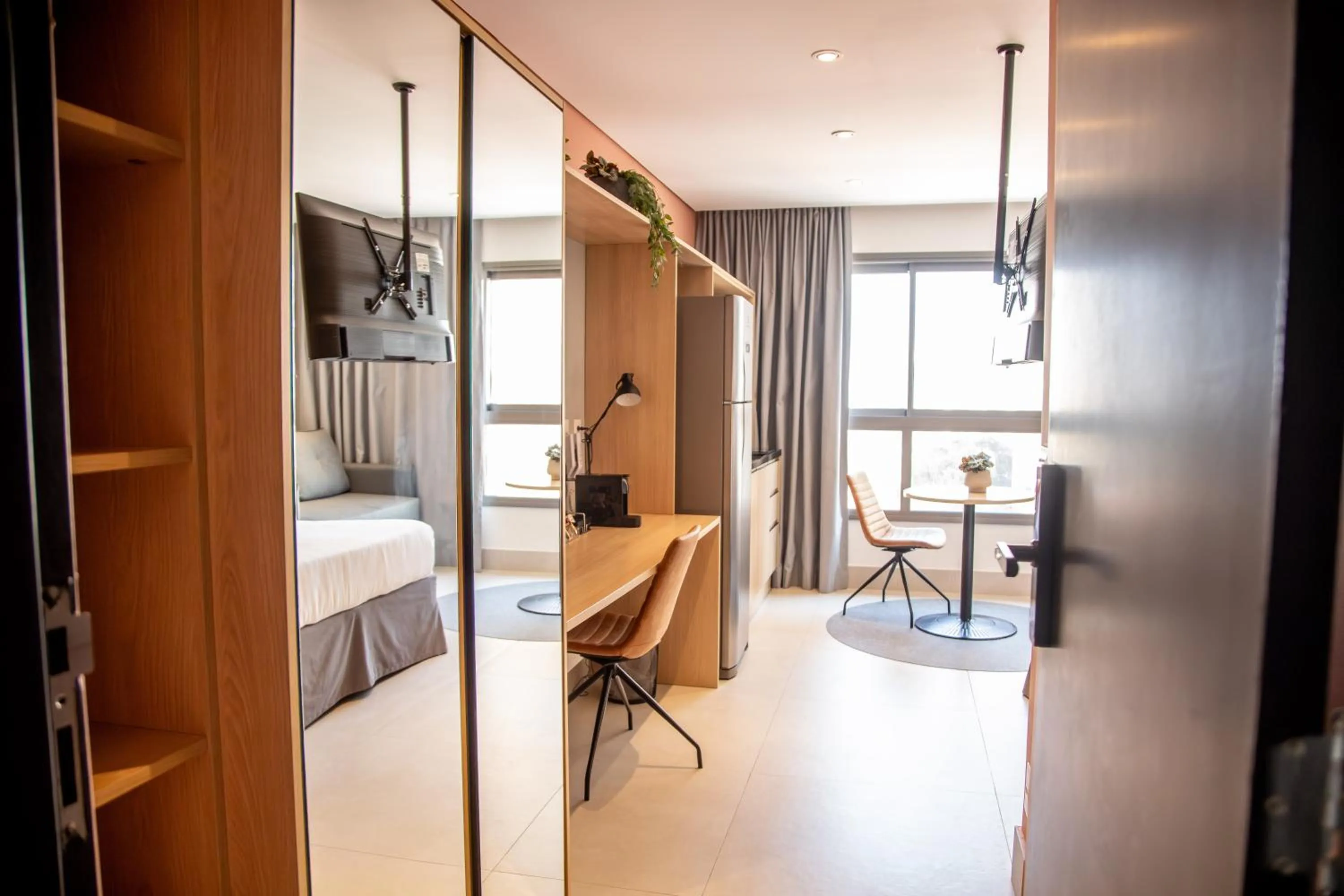 Bedroom, Bed in Cozzy Suites Paraíso Hotel