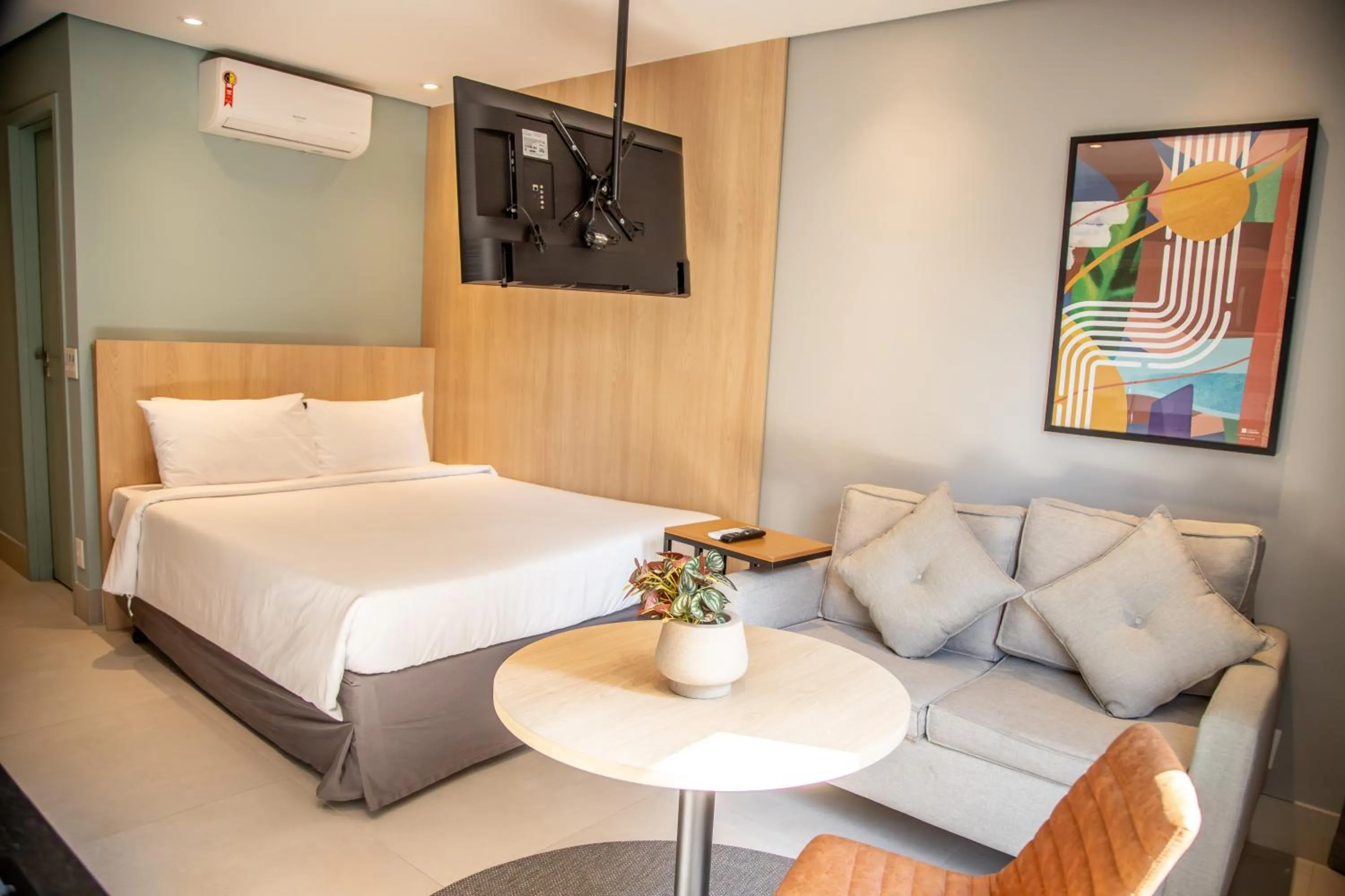 Bed in Cozzy Suites Paraíso Hotel