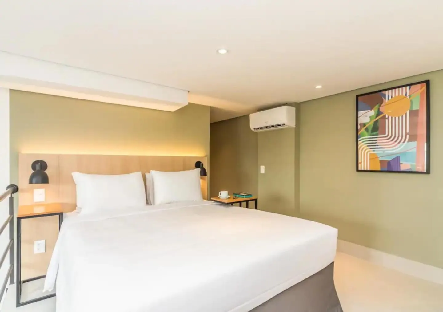 Bed in Cozzy Suites Paraíso Hotel