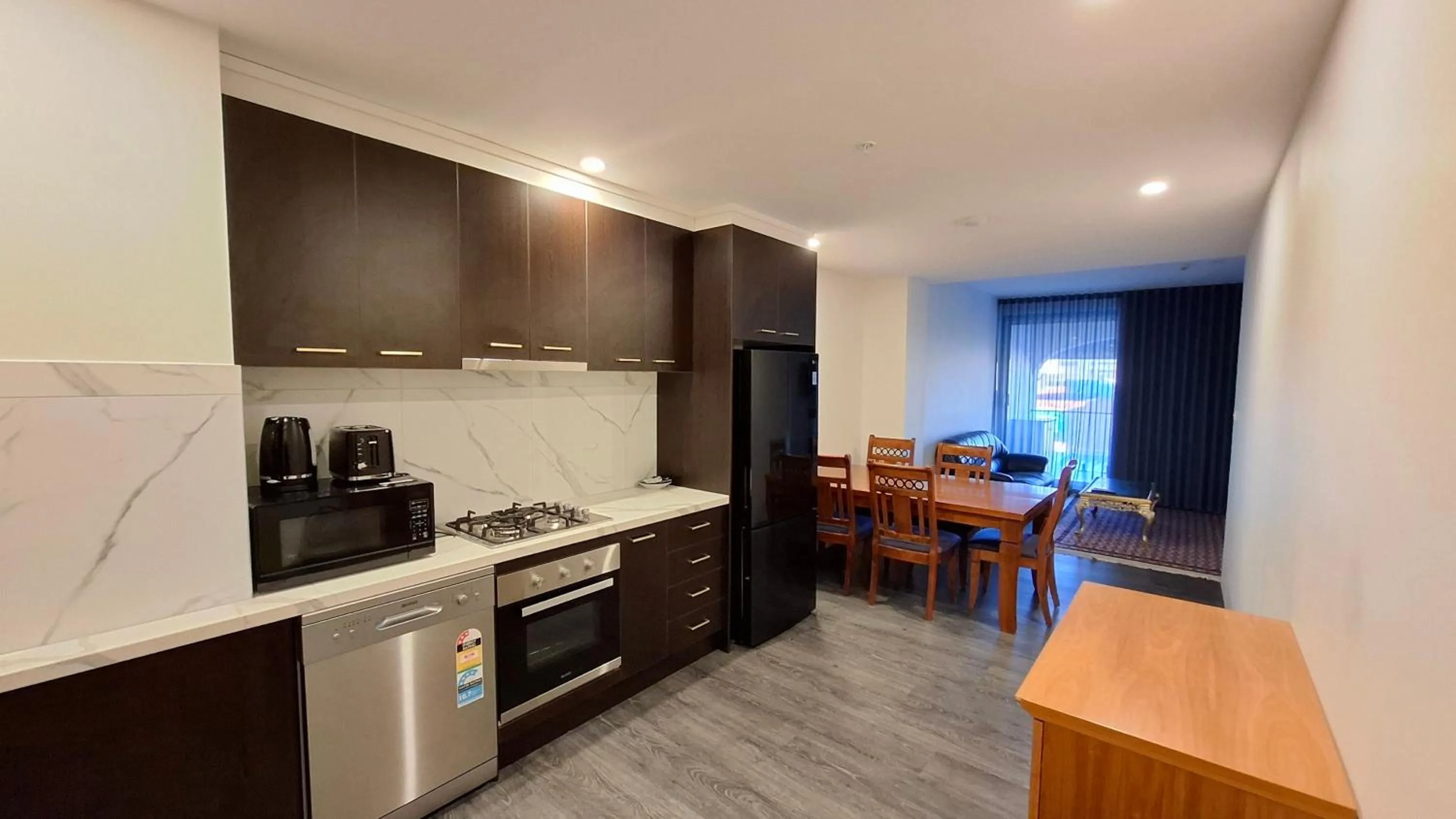 Kitchen or kitchenette in Exodus Dandenong Apartment Hotel