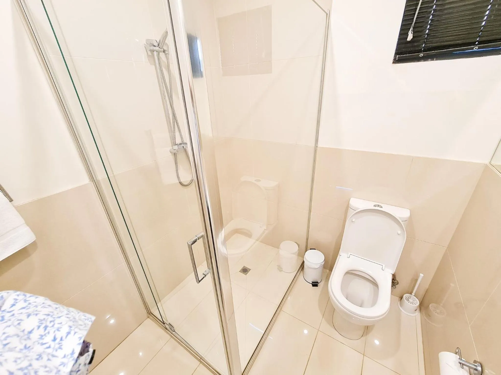 Shower in Exodus Dandenong Apartment Hotel