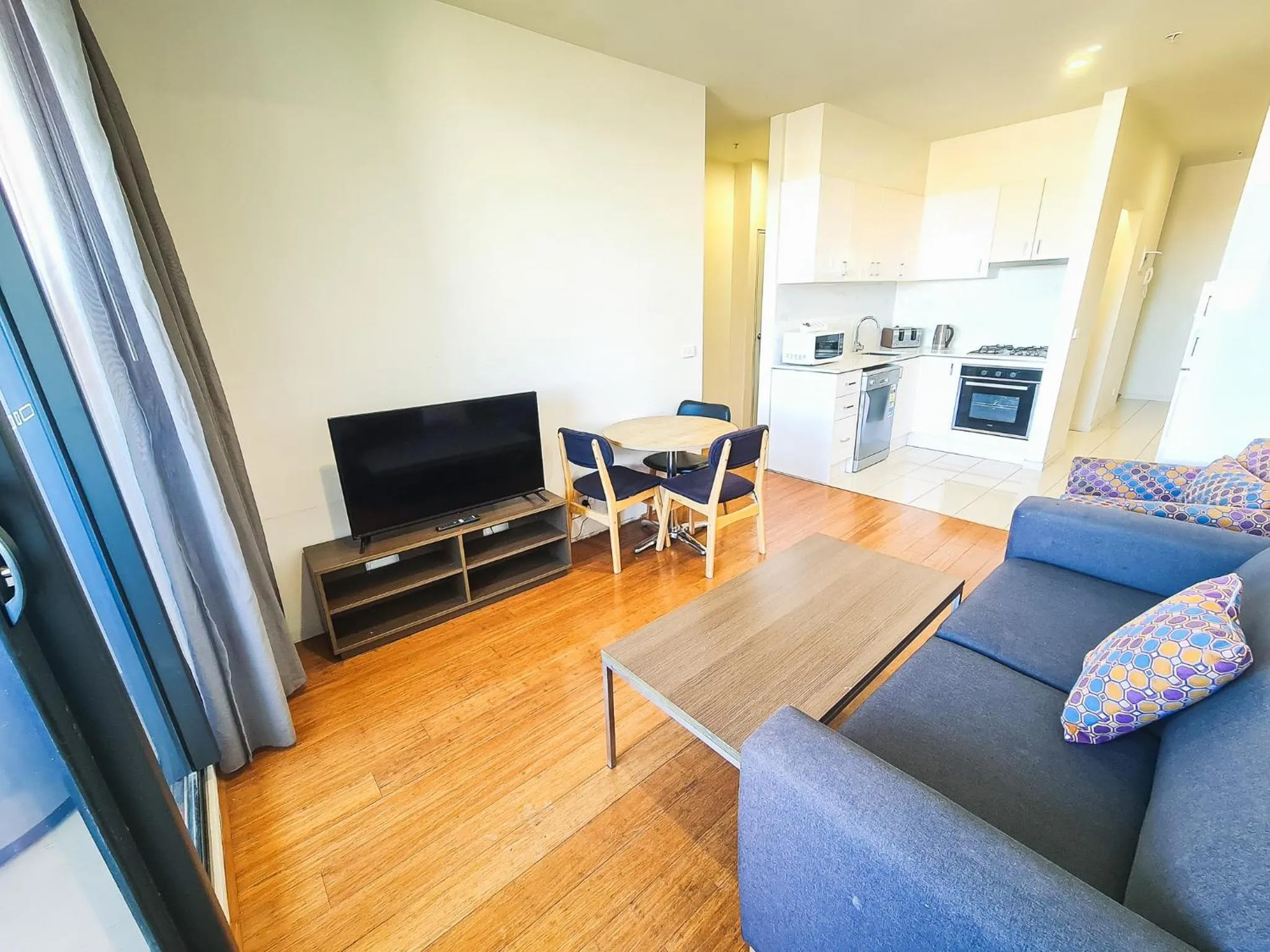 Communal lounge/ TV room in Exodus Dandenong Apartment Hotel