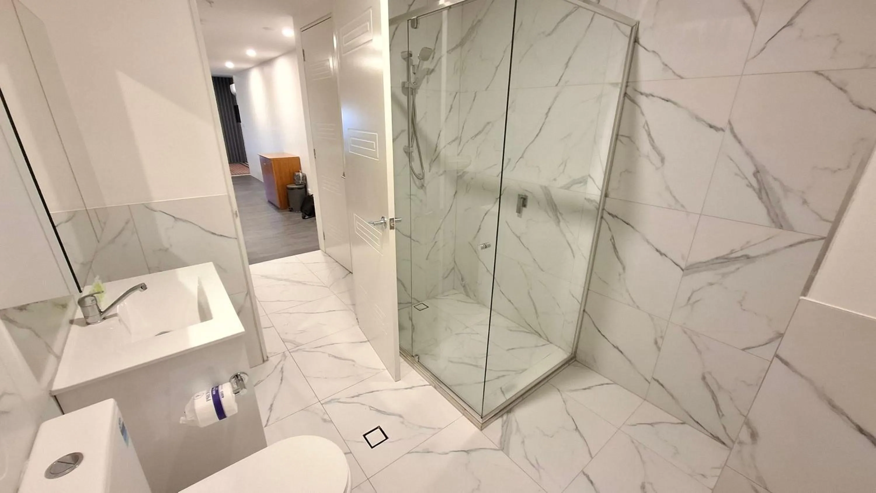 Shower in Exodus Dandenong Apartment Hotel