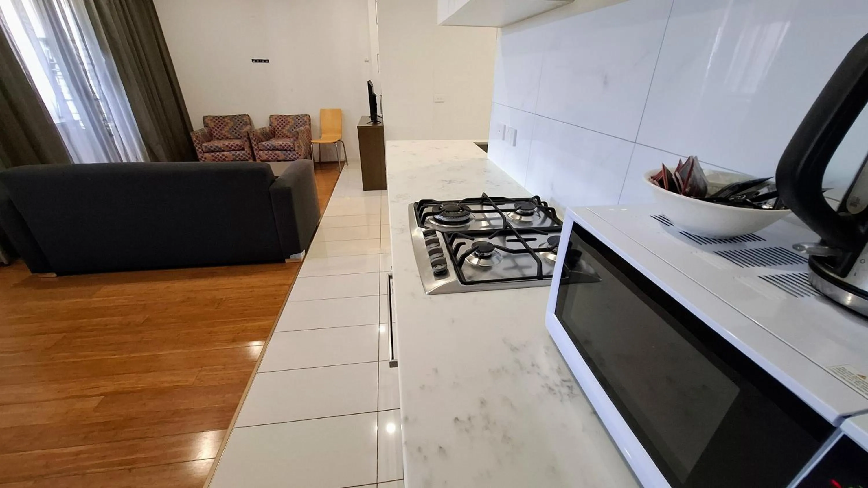 Kitchen or kitchenette in Exodus Dandenong Apartment Hotel