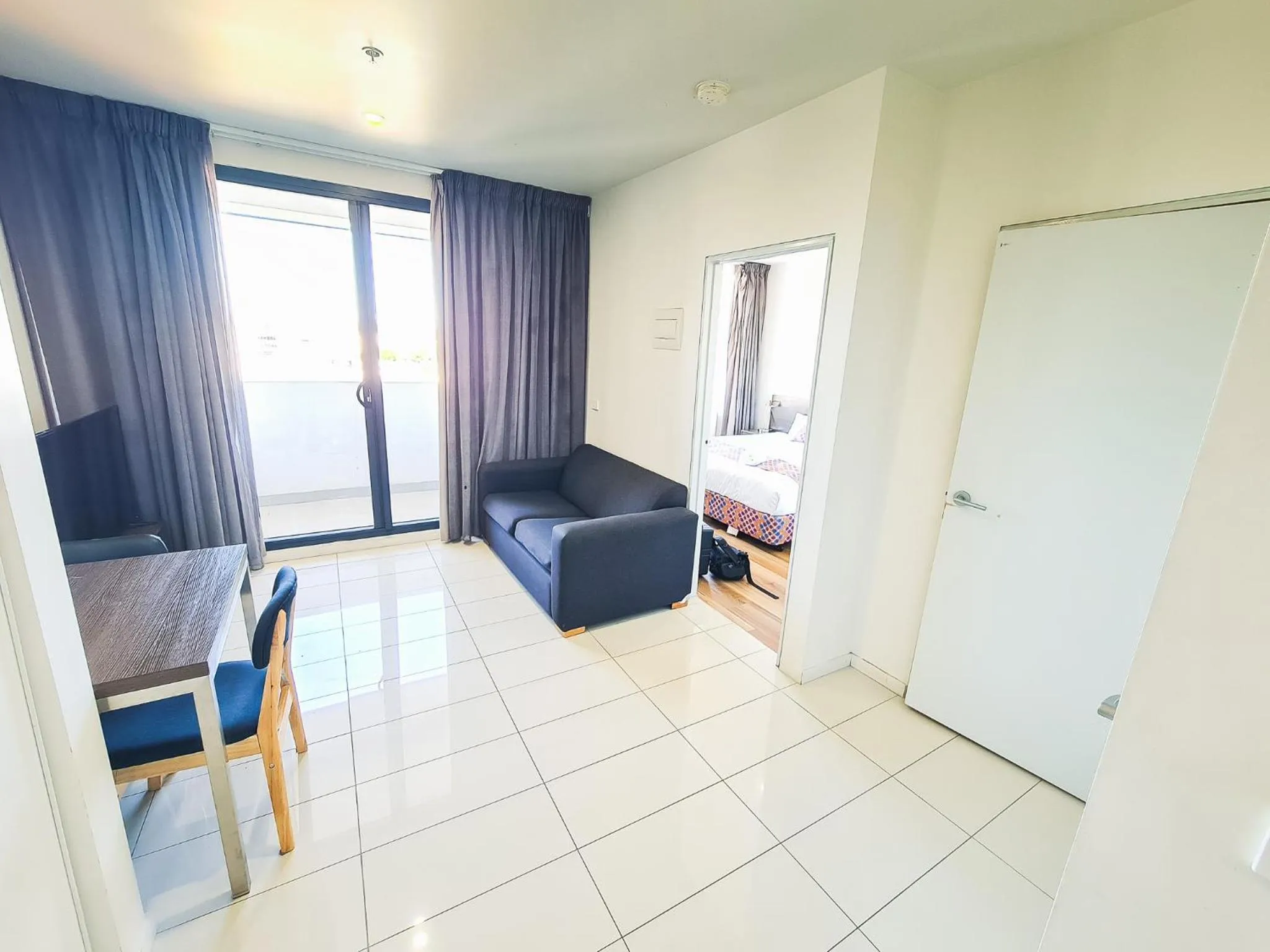 Living room, Bed in Exodus Dandenong Apartment Hotel