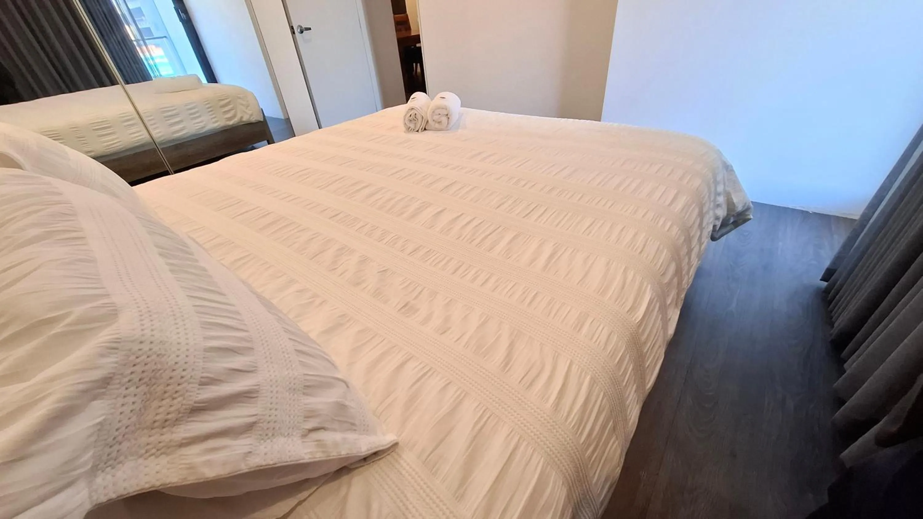 Bed in Exodus Dandenong Apartment Hotel