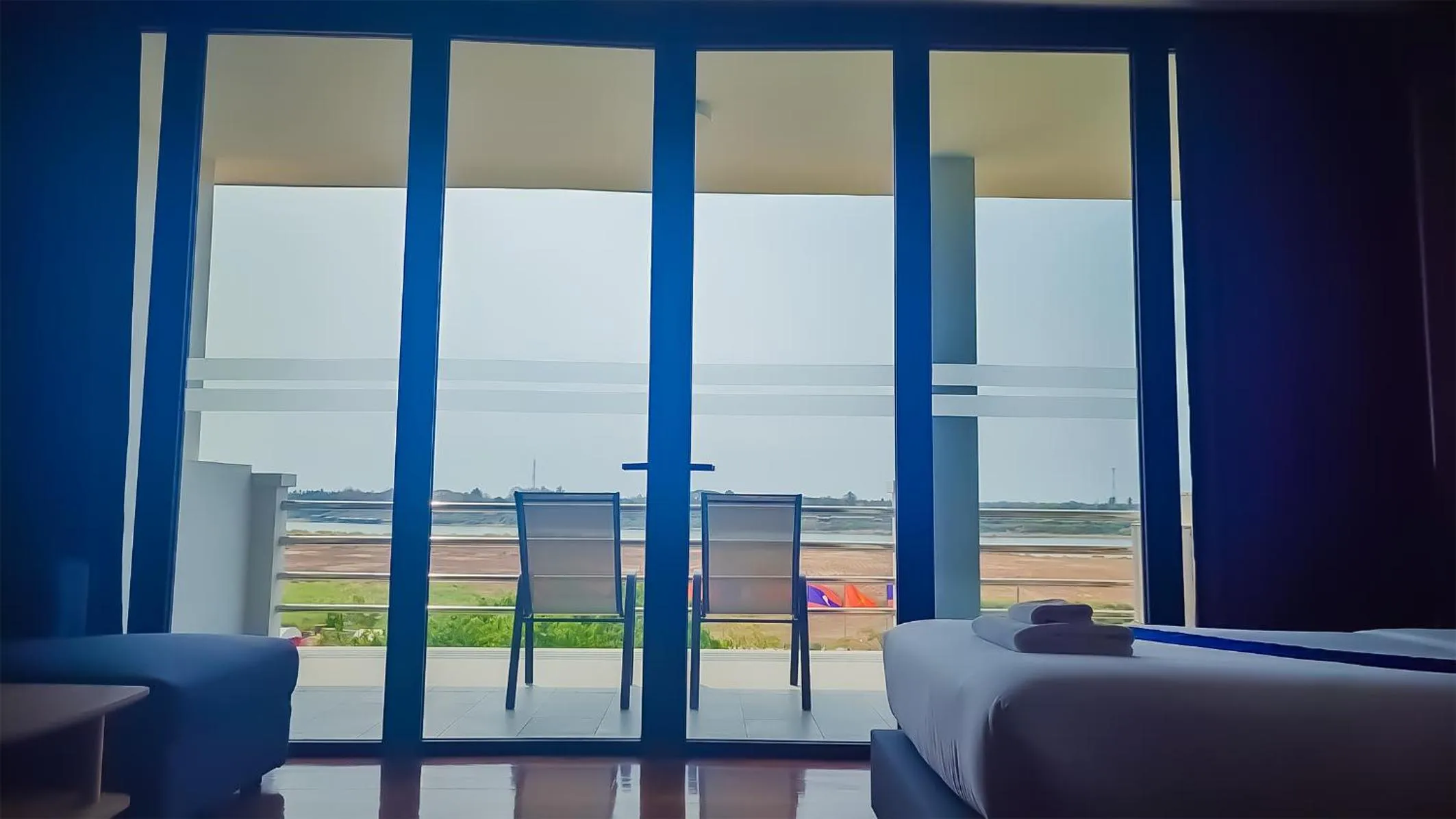 Bed in The Riva Vientiane Hotel