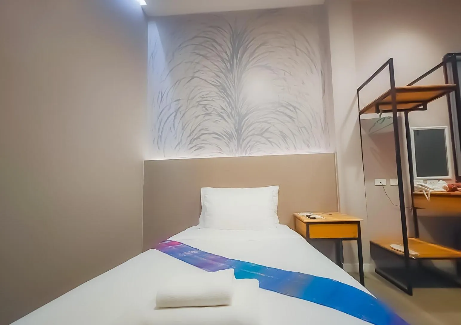 Bed in The Riva Vientiane Hotel