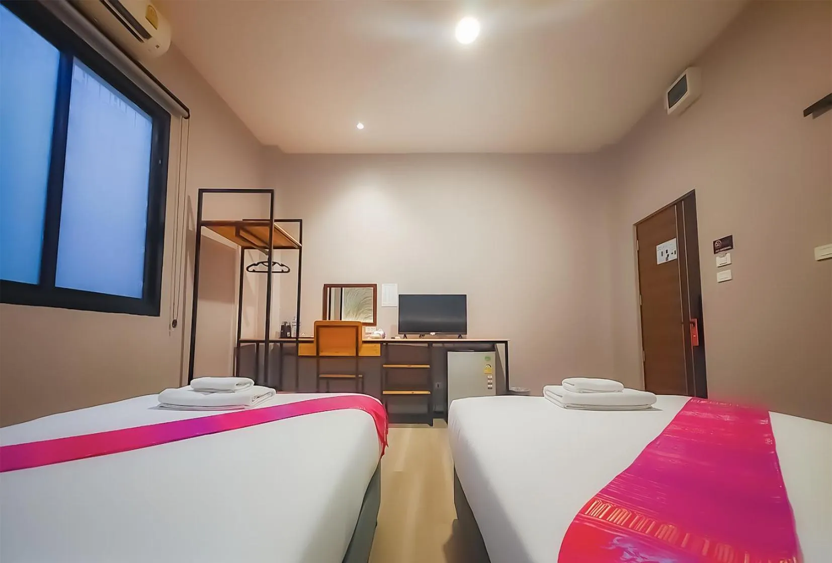 Bed in The Riva Vientiane Hotel