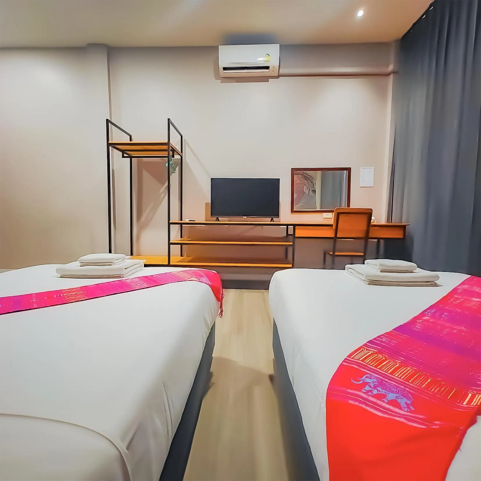 Bed in The Riva Vientiane Hotel