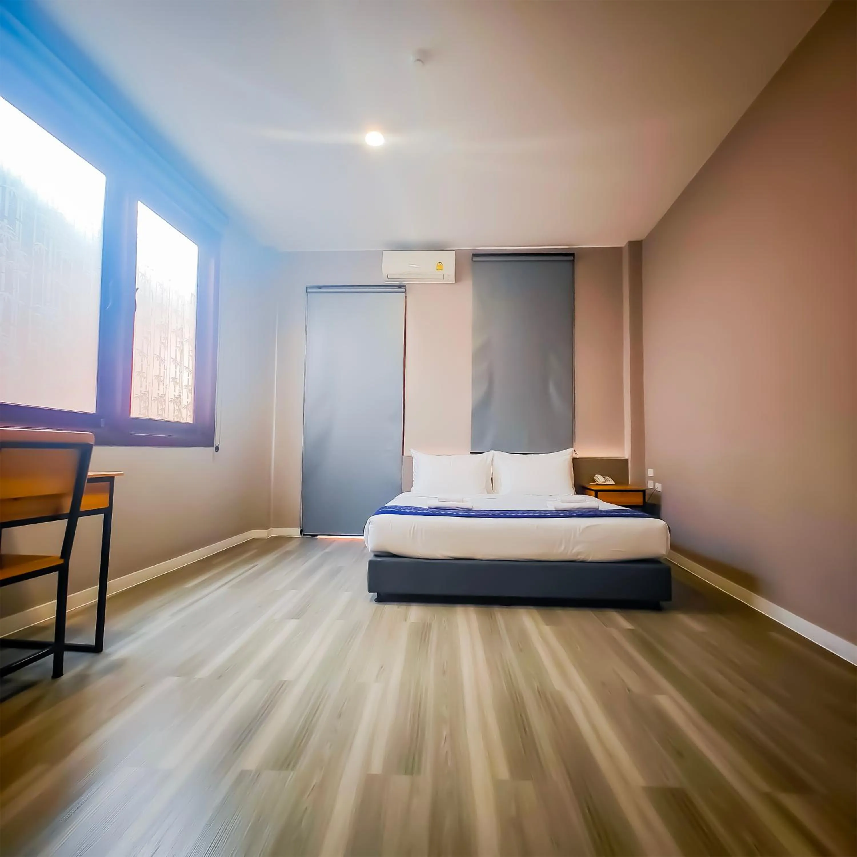 Bed in The Riva Vientiane Hotel