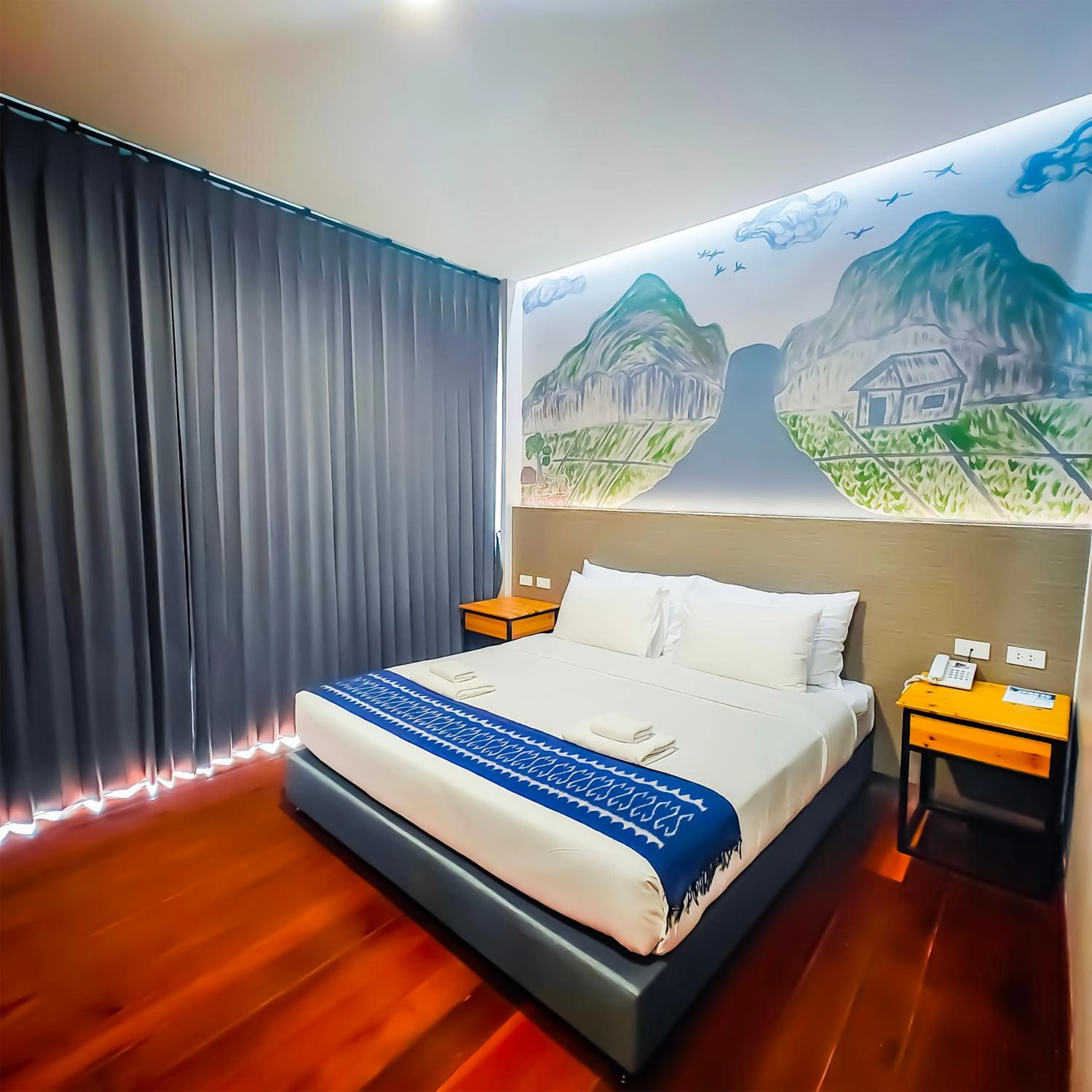 Bed in The Riva Vientiane Hotel