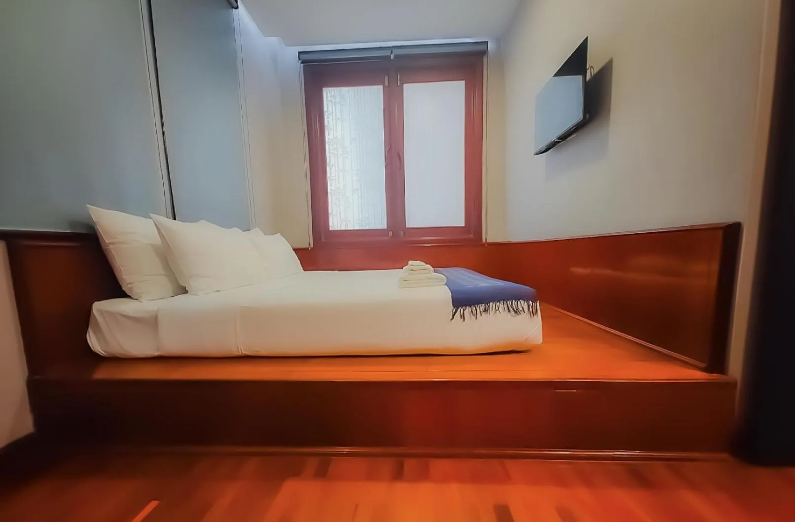 Bed in The Riva Vientiane Hotel