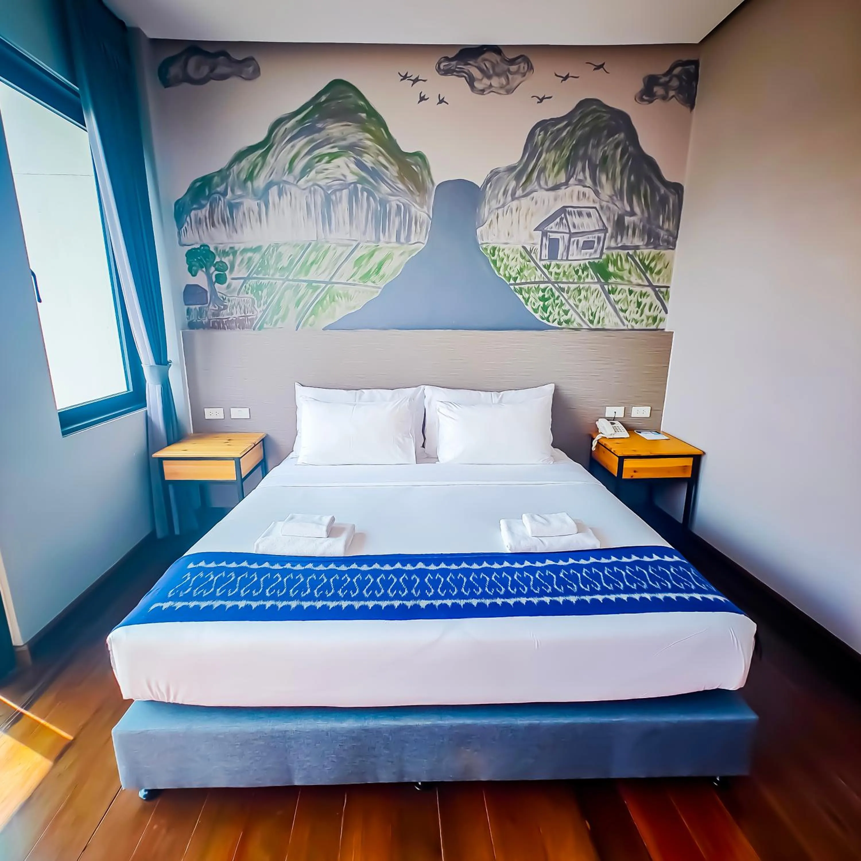 Bed in The Riva Vientiane Hotel