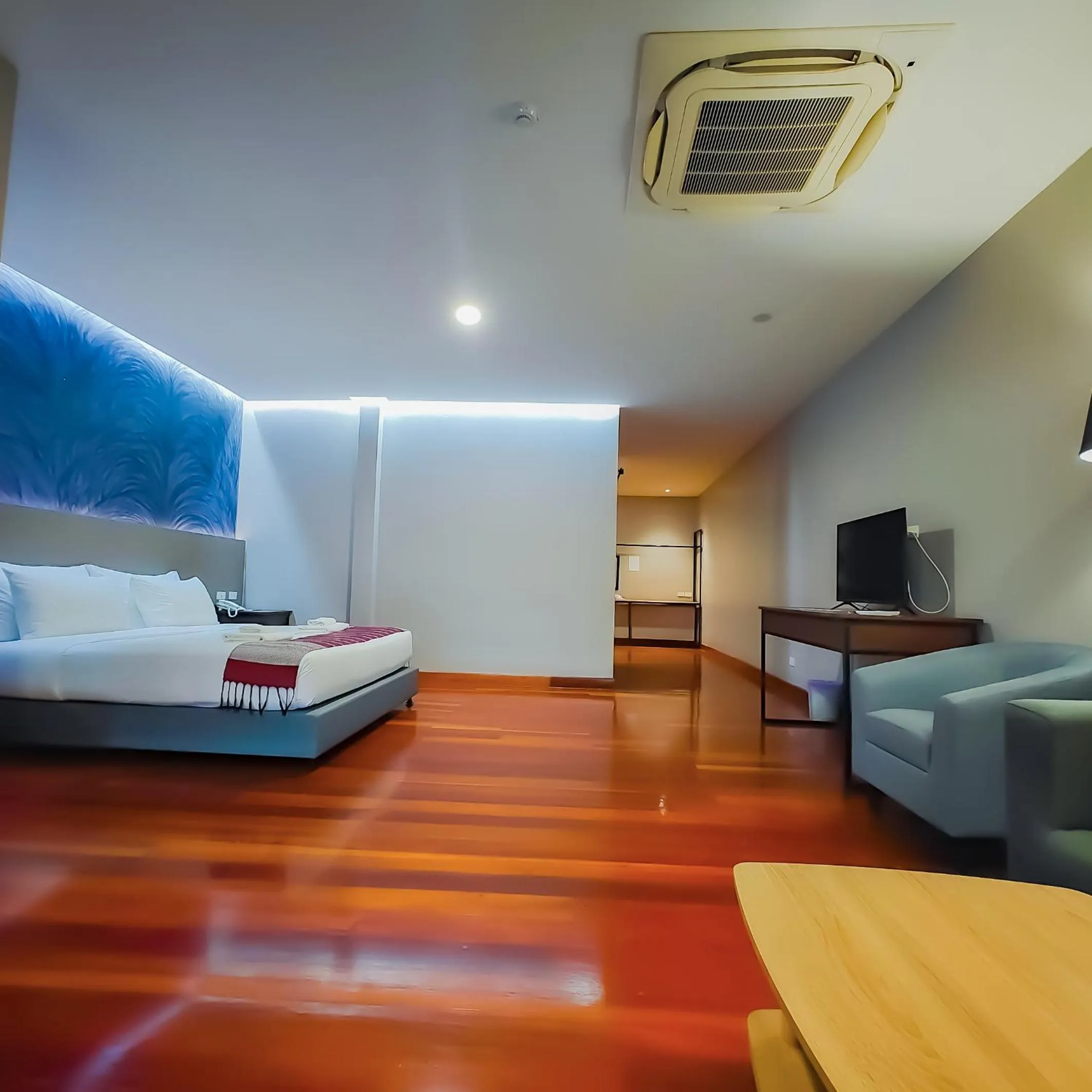 Bed in The Riva Vientiane Hotel