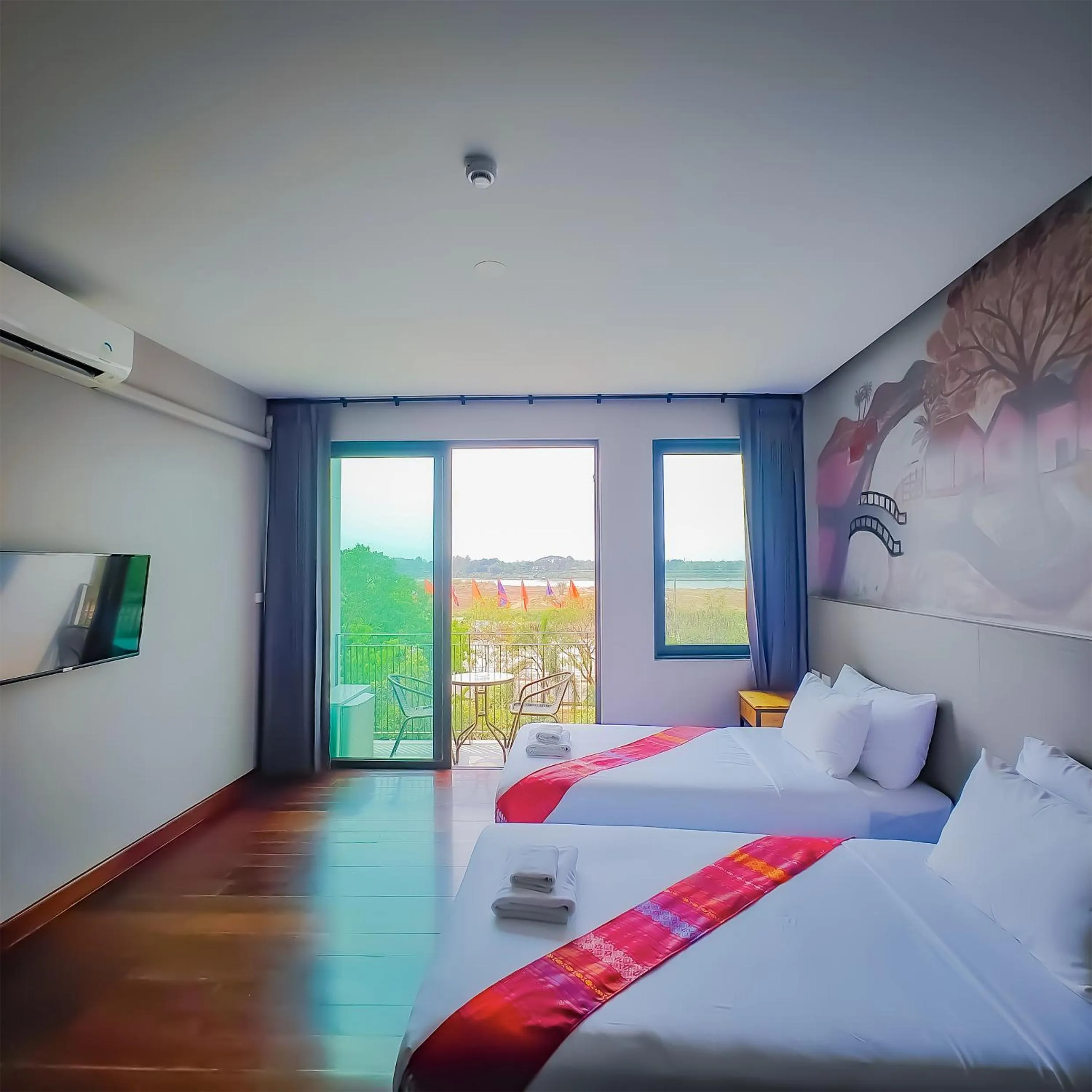 Bed in The Riva Vientiane Hotel