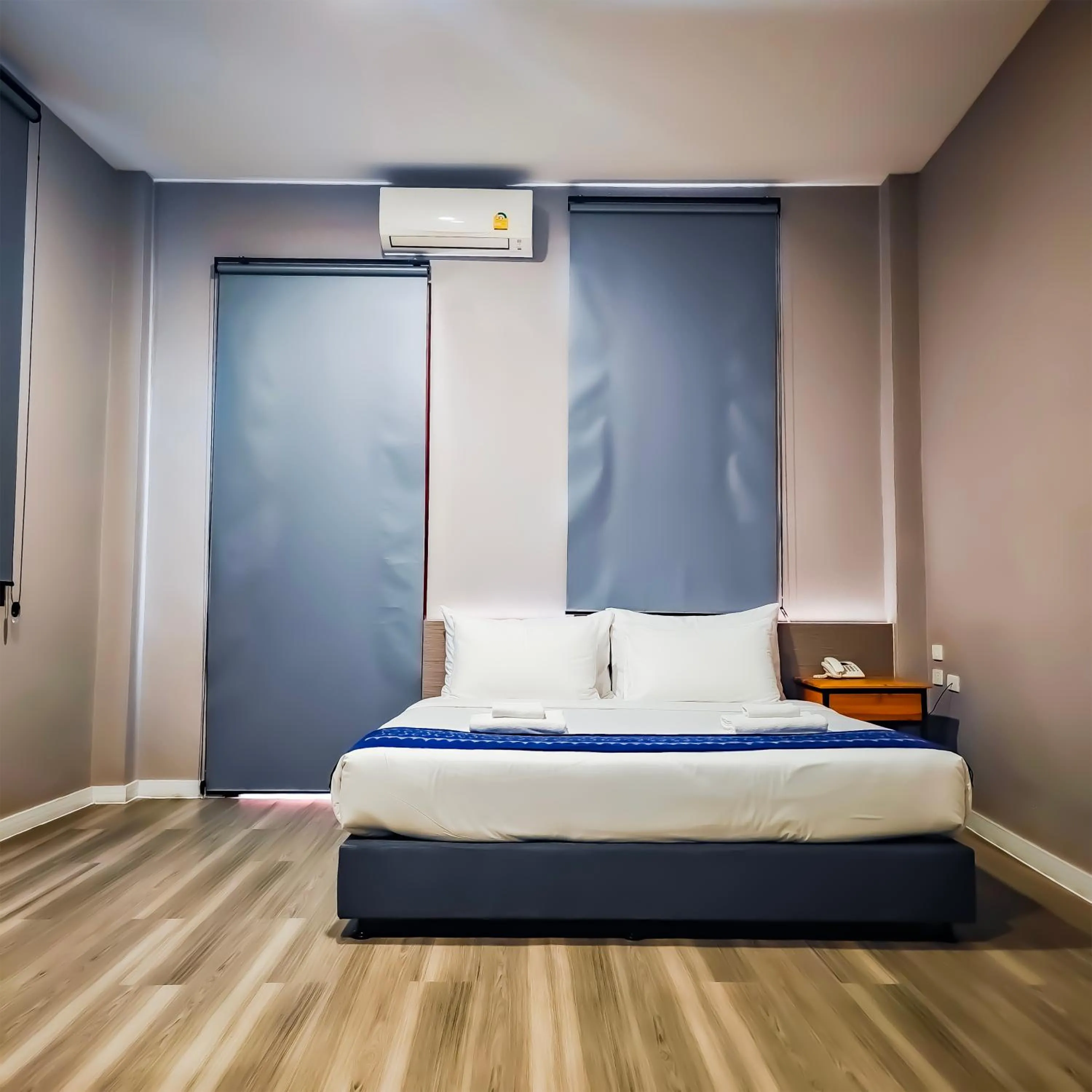 Bed in The Riva Vientiane Hotel