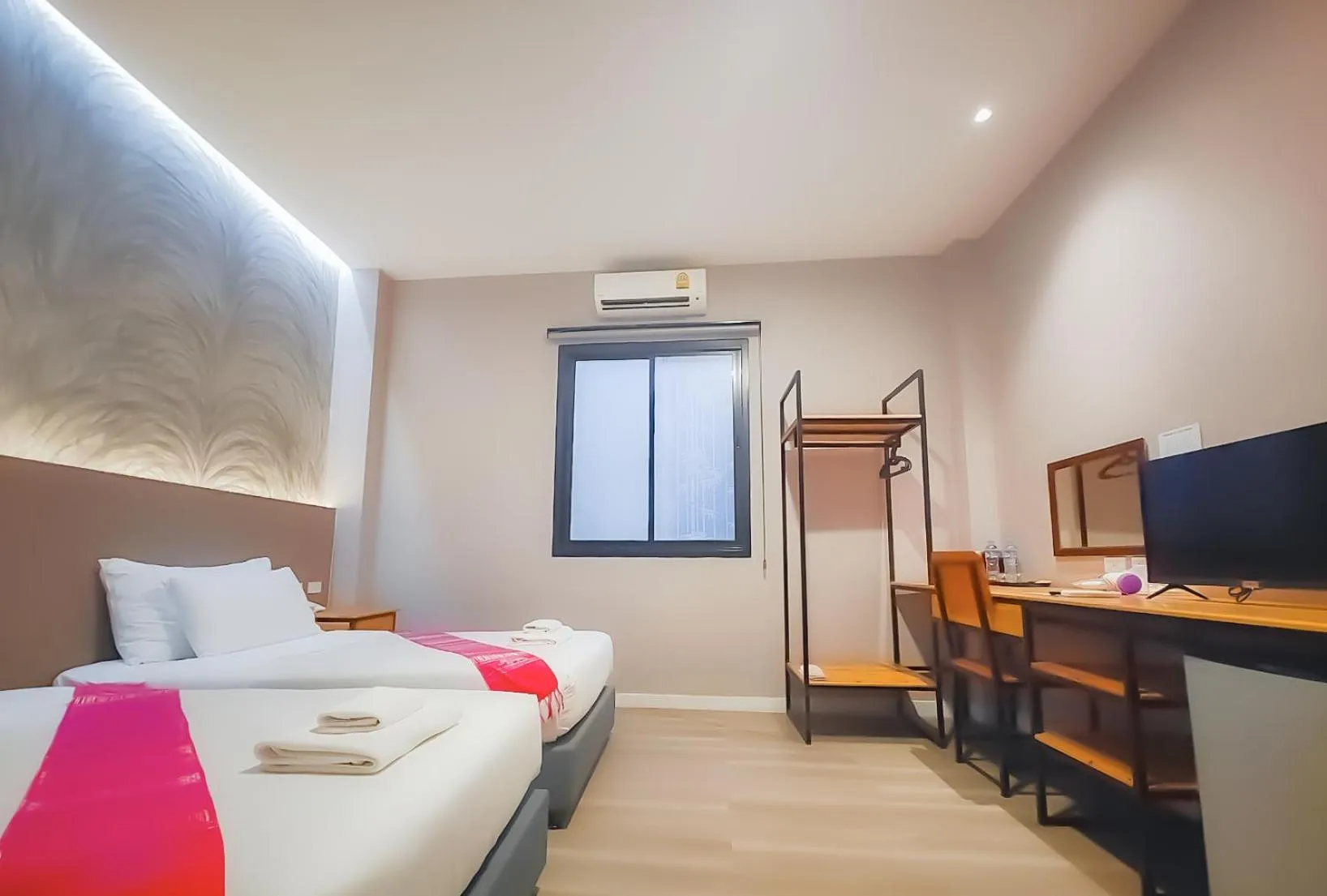 Bed in The Riva Vientiane Hotel