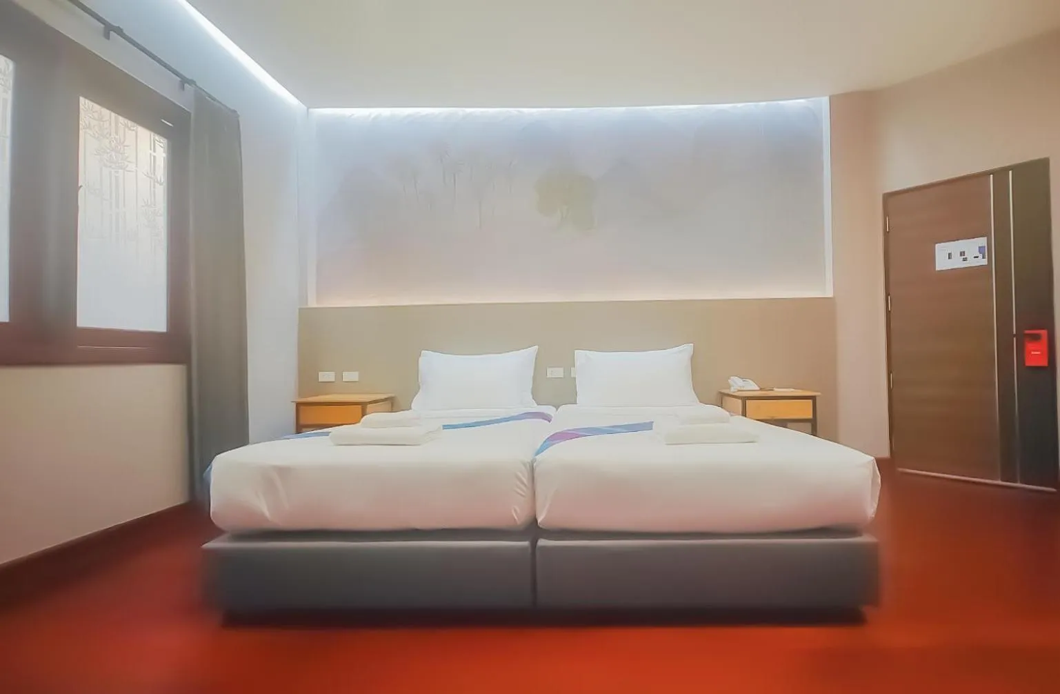 Bed in The Riva Vientiane Hotel