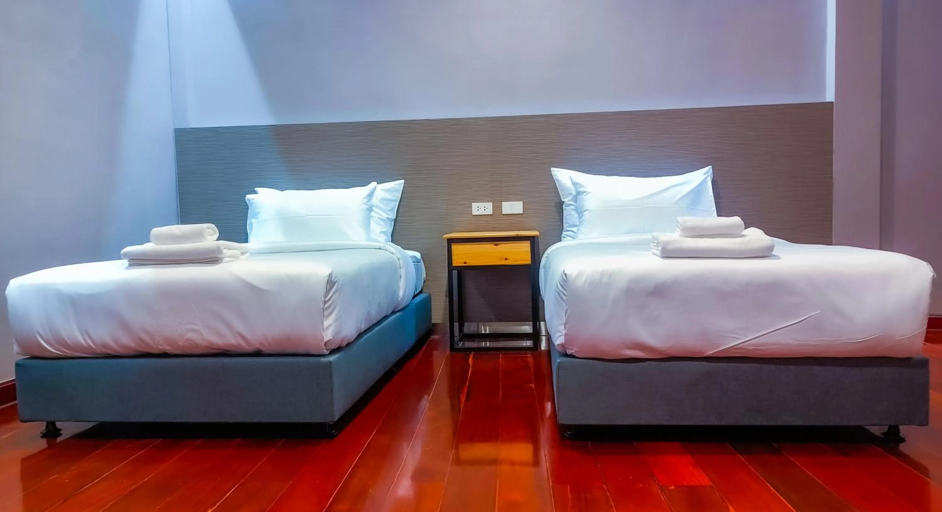 Bed in The Riva Vientiane Hotel