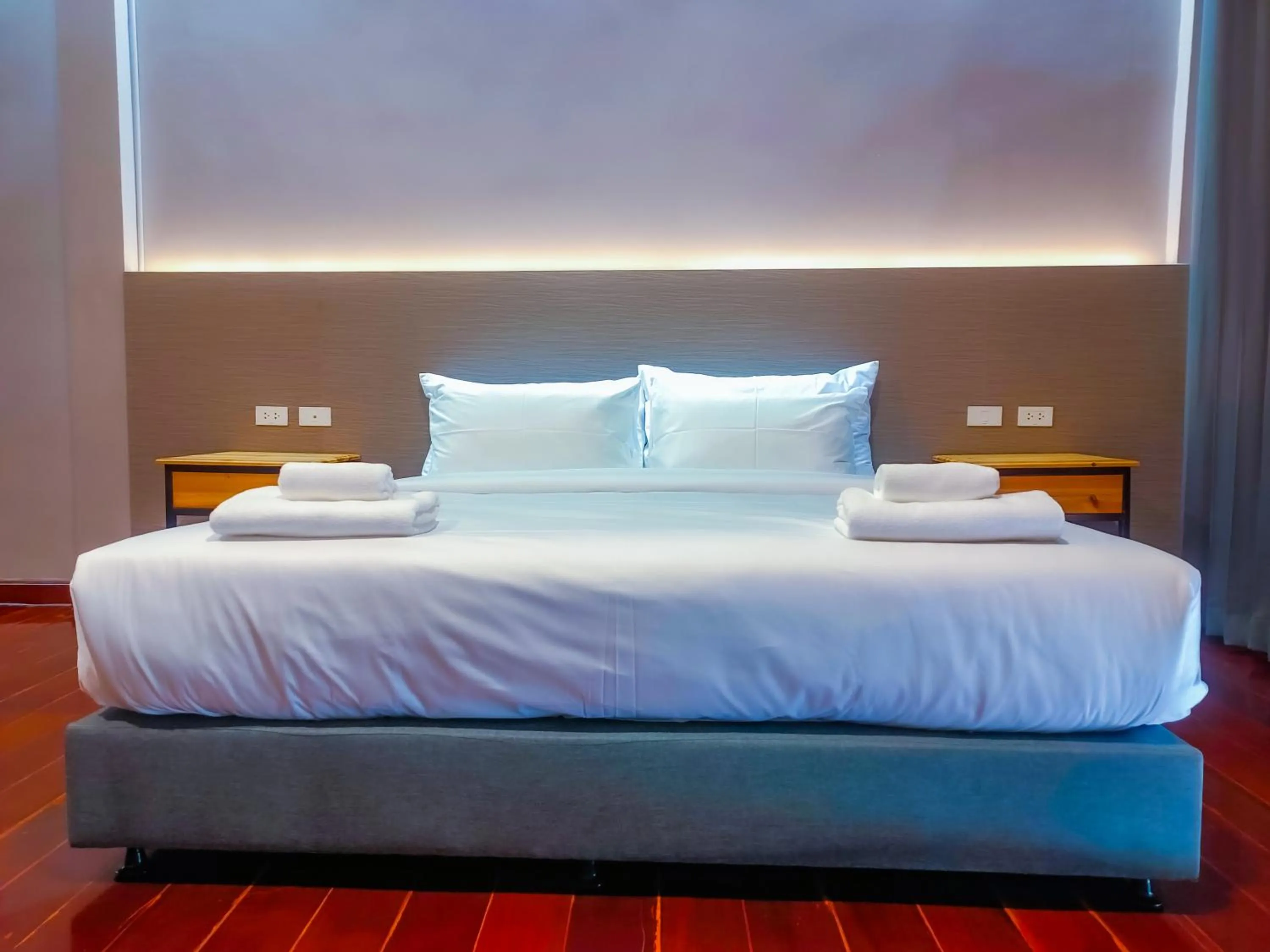 Bed in The Riva Vientiane Hotel