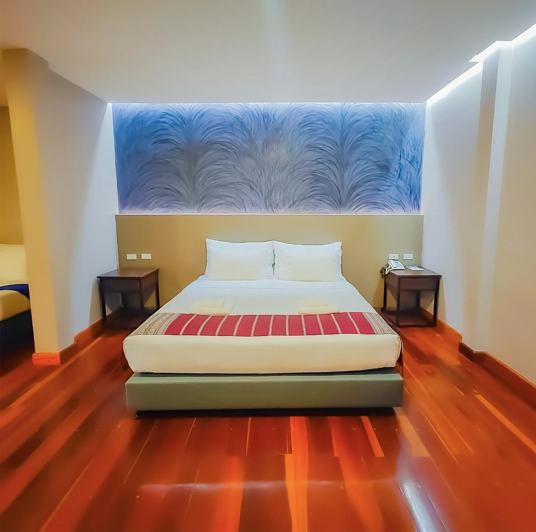 Bed in The Riva Vientiane Hotel