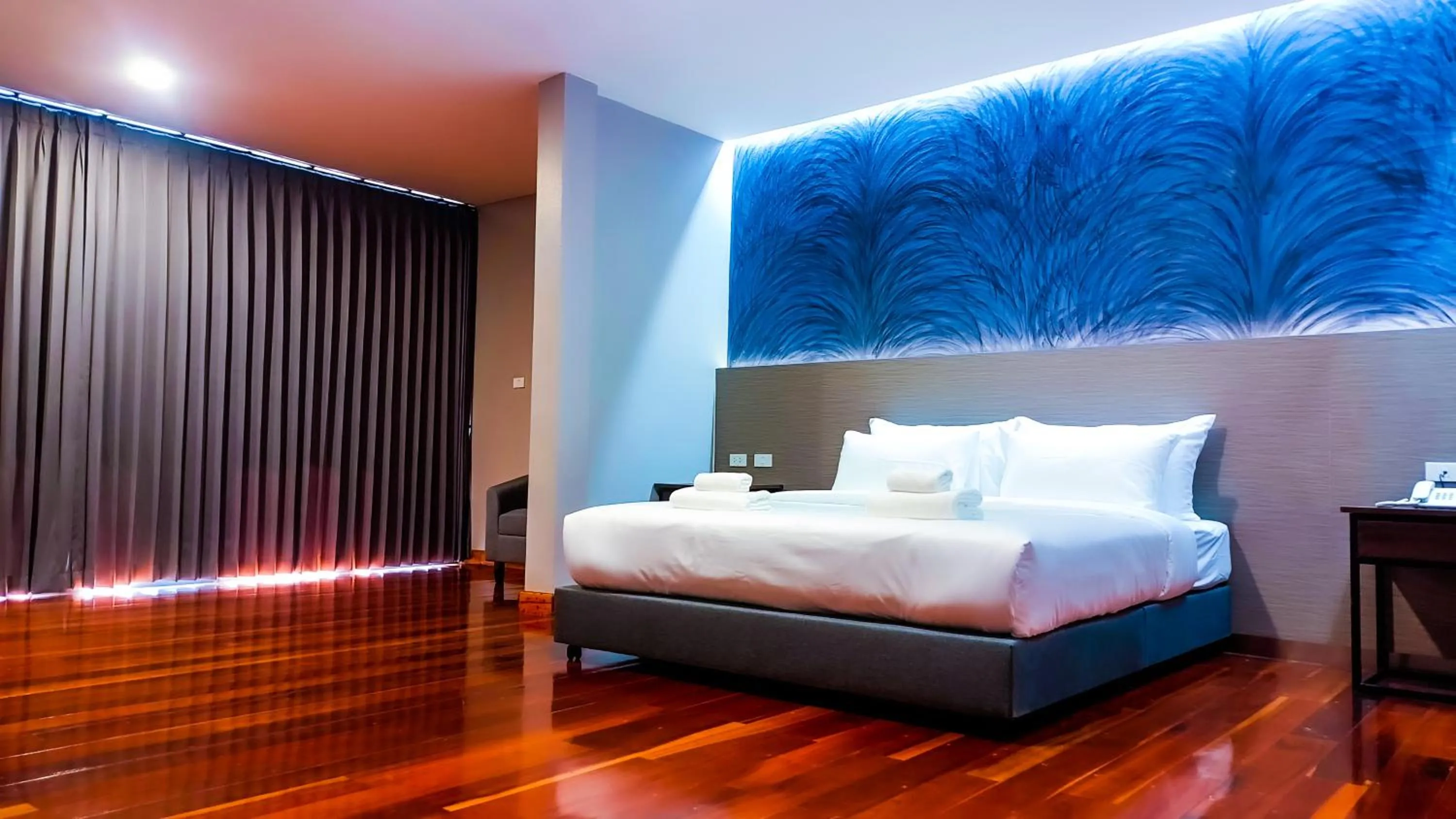 Bed in The Riva Vientiane Hotel