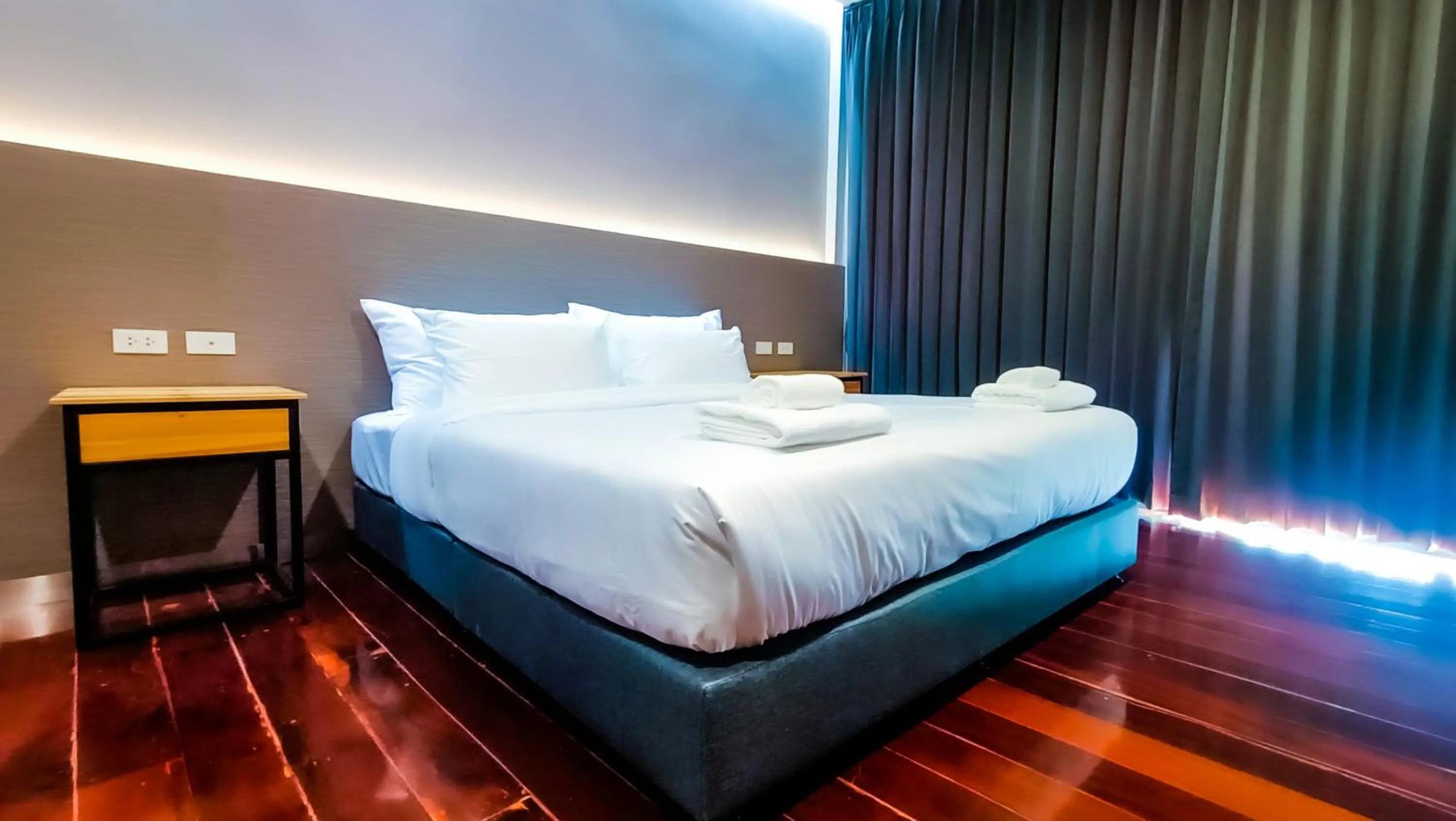 Bed in The Riva Vientiane Hotel