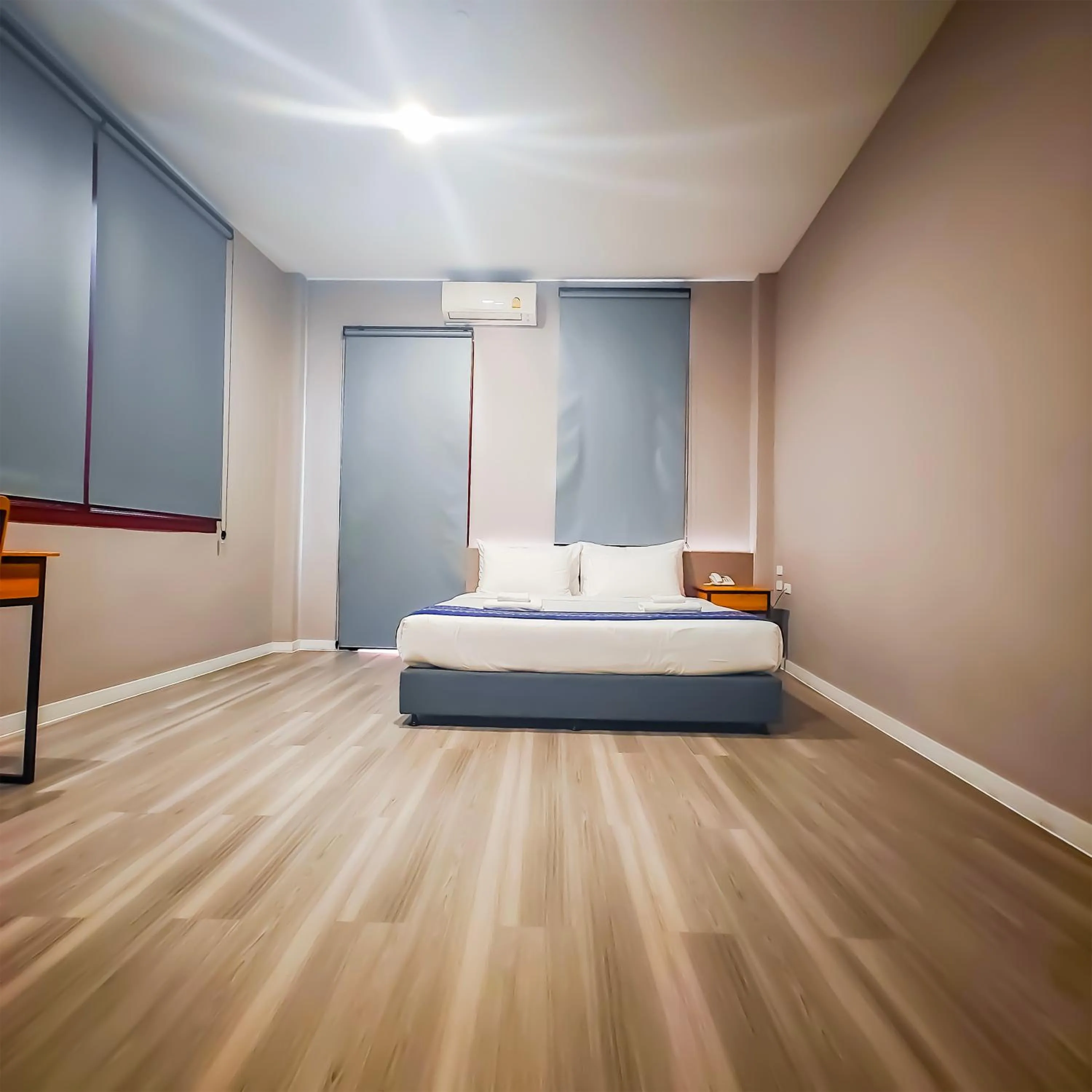 Bed in The Riva Vientiane Hotel