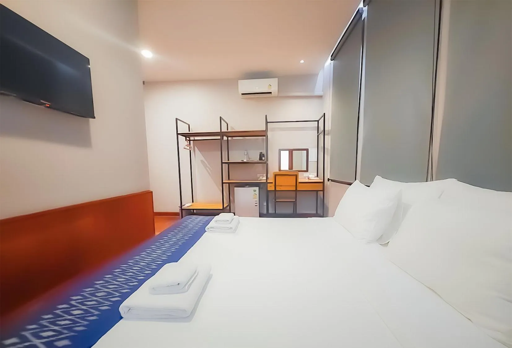 Bed in The Riva Vientiane Hotel