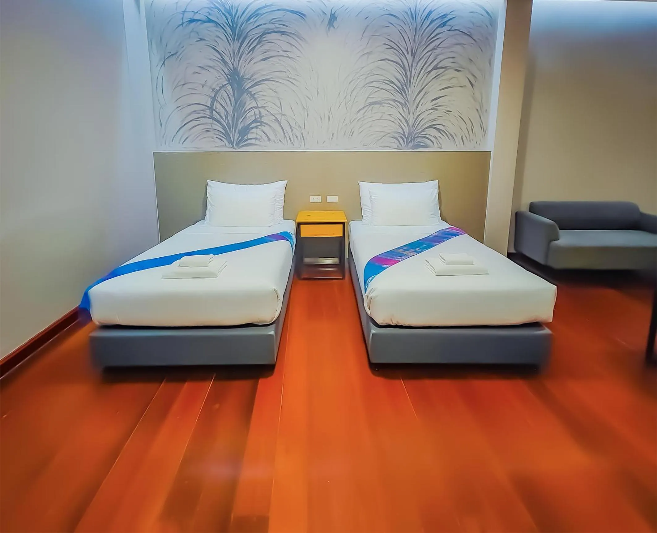 Bed in The Riva Vientiane Hotel