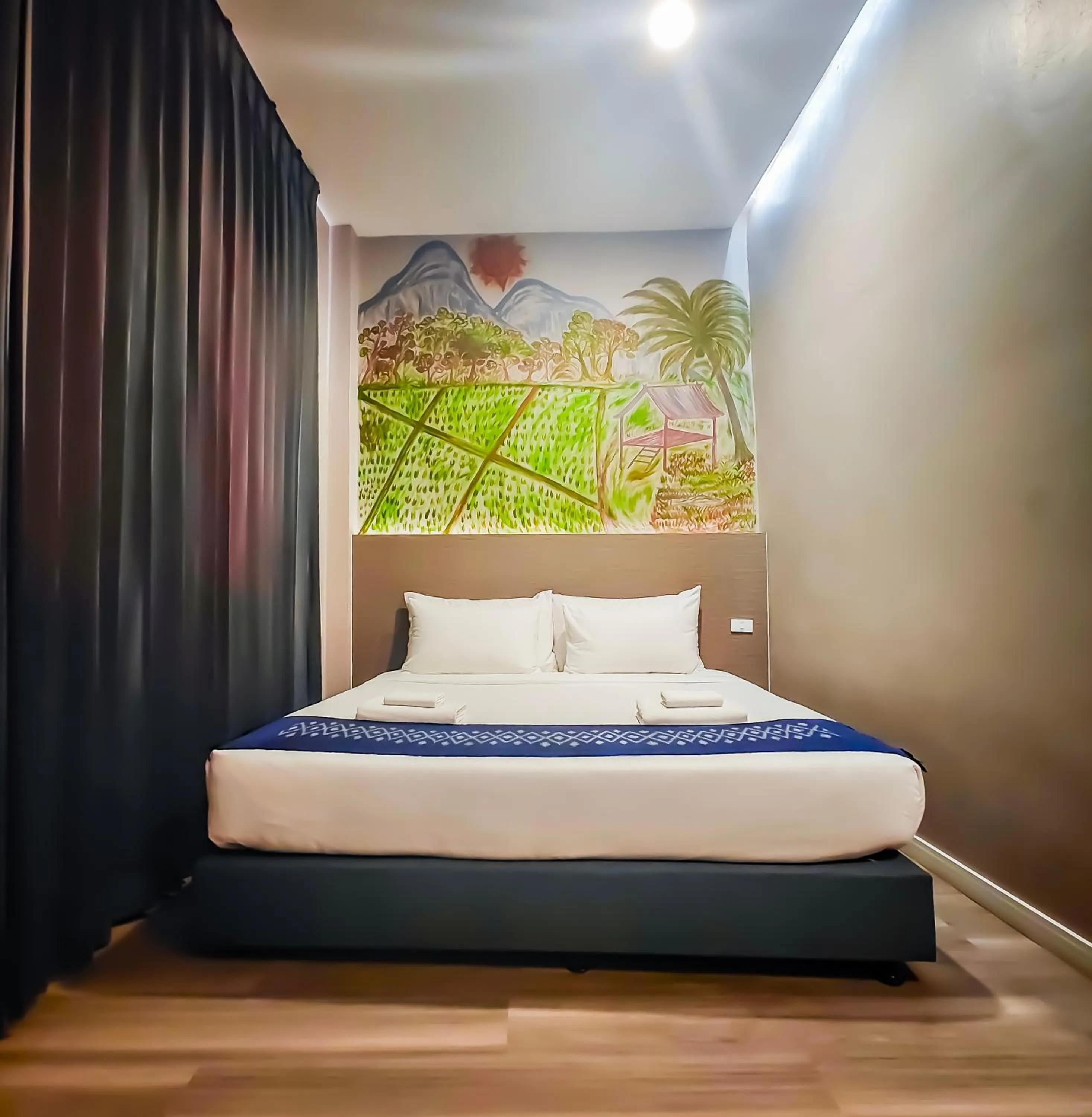 Bed in The Riva Vientiane Hotel